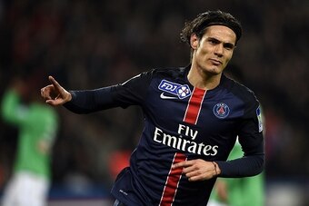 Paris Saint-Germain's Uruguyan forward Edinson Cavani celebrates after scoring a  goal during the French League Cup match between Paris Saint-Germain (PSG) and Saint-Etienne (ASSE) on December 15, 2015 at the Parc des Princes stadium in Paris. AFP PHOTO /