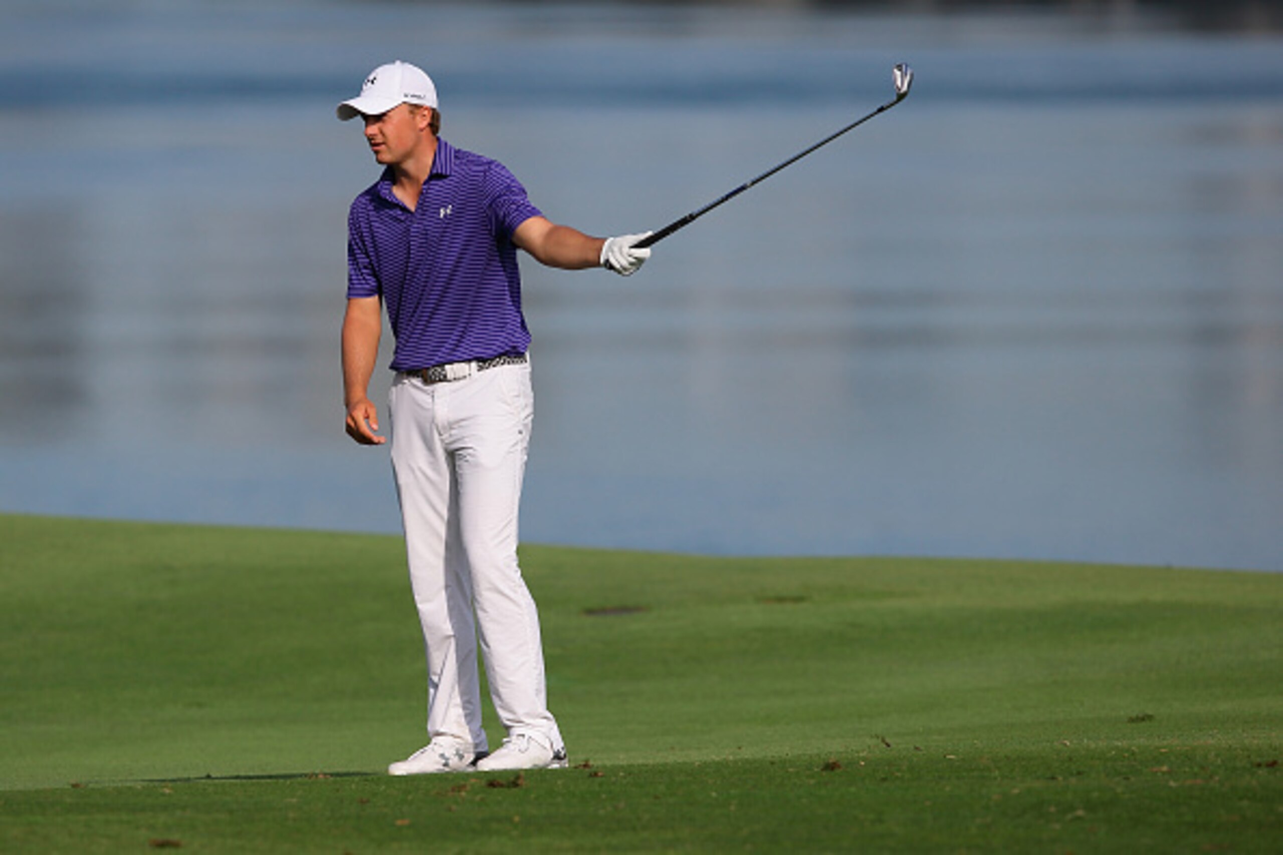 SINGAPORE - JANUARY 30: Jordan Spieth of the United States in action on the fifteen hole during the completion of the inclement weather second round on day three of the SMBC Singapore Open at the Sentosa Golf Club Serapong course on January 30, 2016 in Si