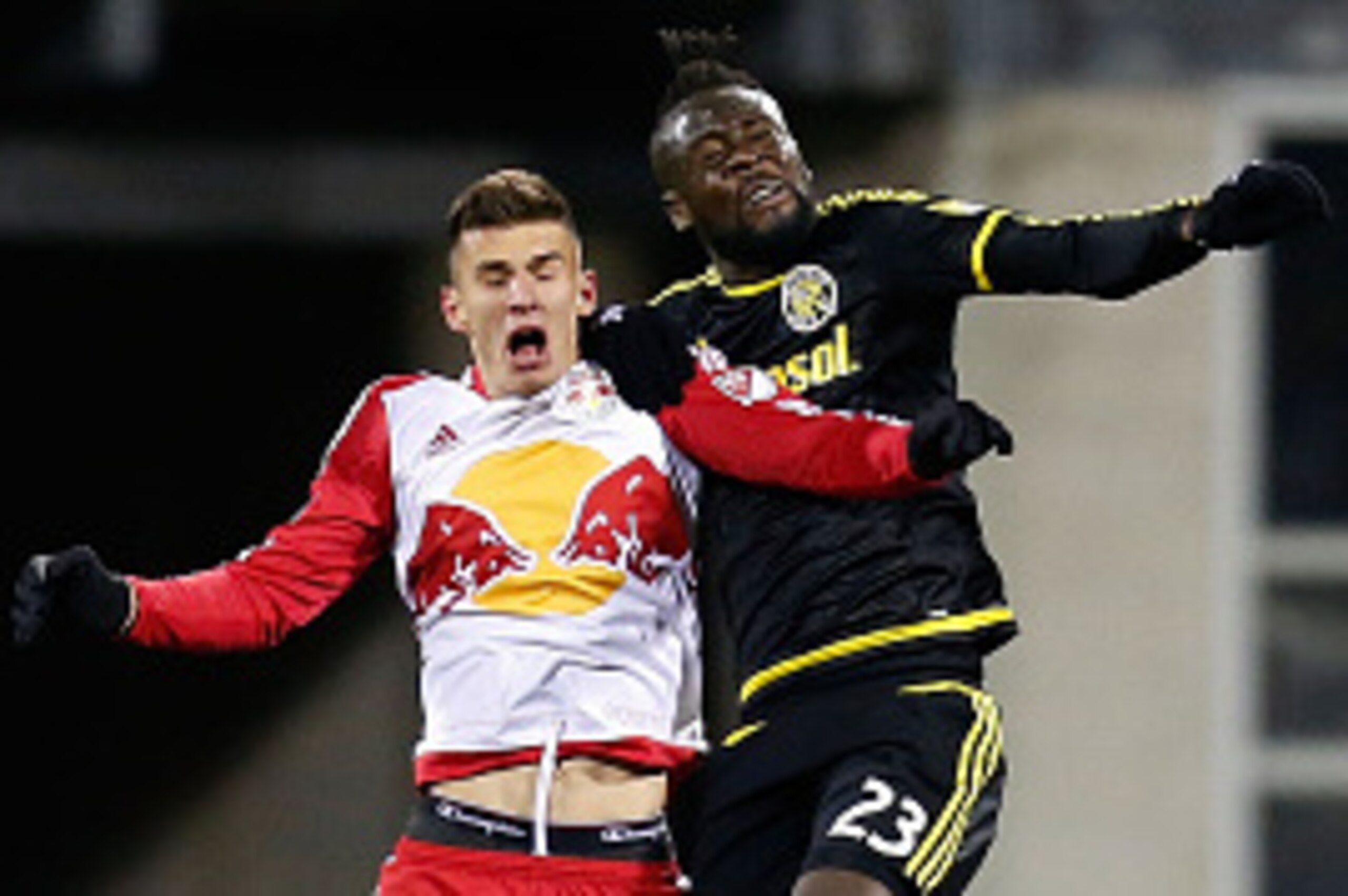 COLUMBUS, OH - NOVEMBER 22: Kei Kamara #23 of the Columbus Crew SC and Matt Miazga #20 of the New York Red Bulls battle to win a header during the match on November 22, 2015 at MAPFRE Stadium in Columbus, Ohio. Columbus defeated New York 2-0. (Photo by Ki