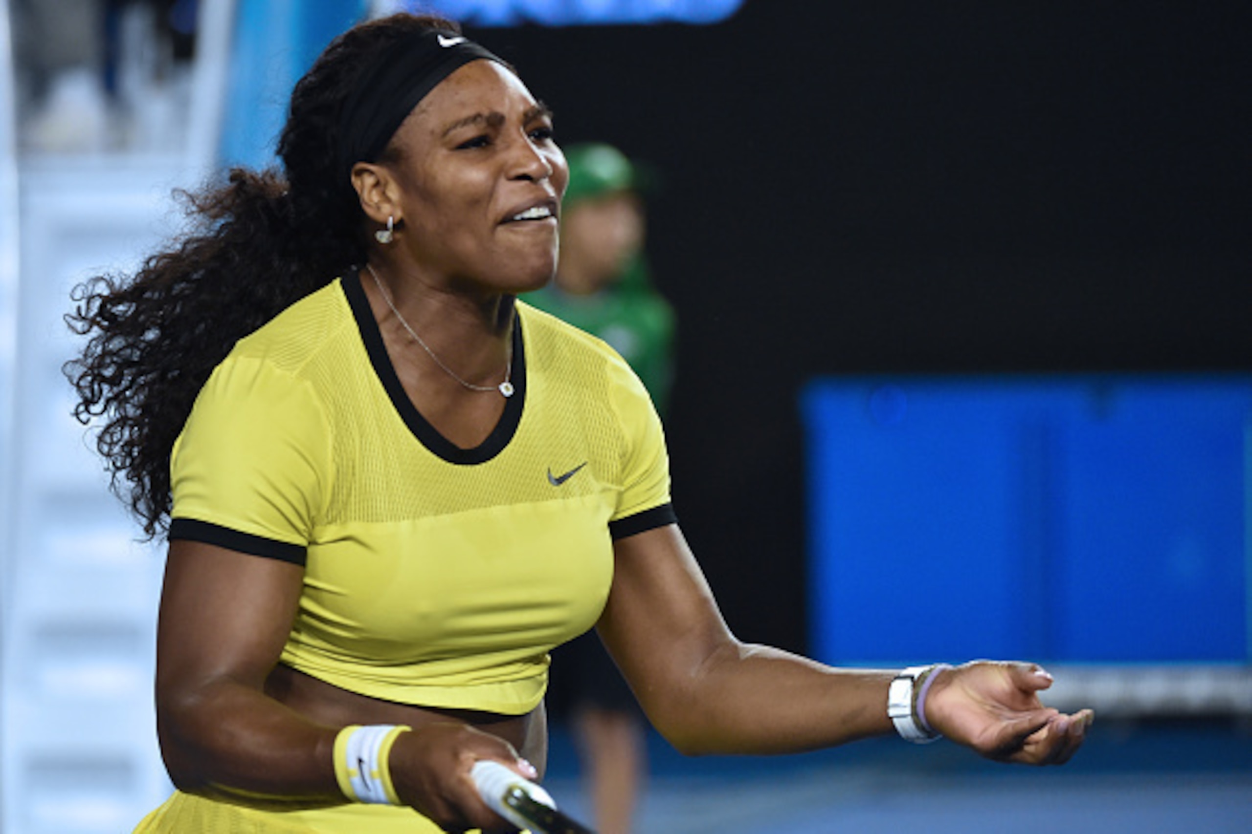 Serena Williams of the US reacts after losing a point during her women's singles final match against Germany's Angelique Kerber on day thirteen of the 2016 Australian Open tennis tournament in Melbourne on January 30, 2016. AFP PHOTO / SAEED KHAN-- IMAGE 