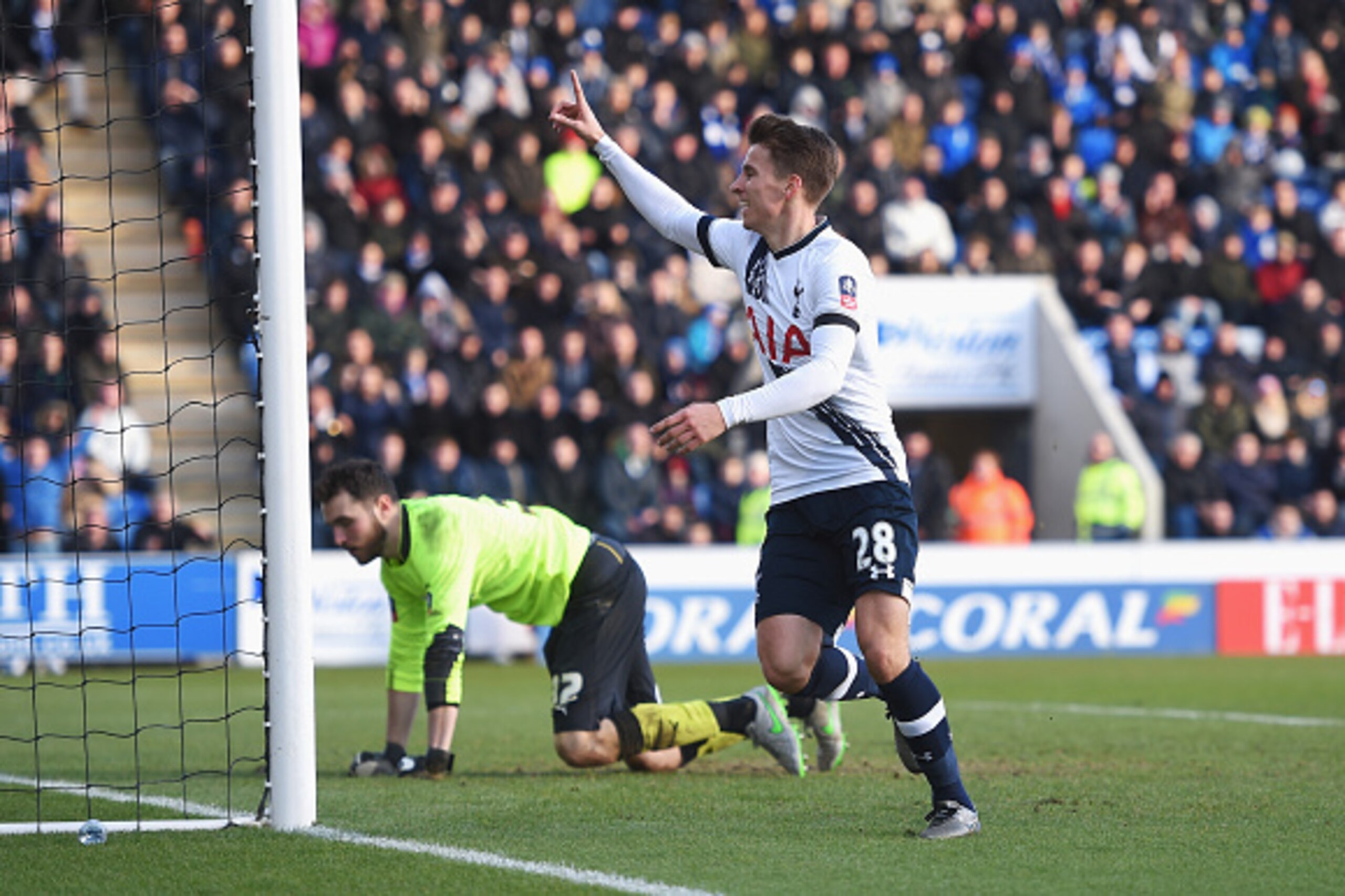COLCHESTER, ENGLAND - JANUARY 30: Tom Carroll of Tottenham Hotspur celebrates scoring his team's fourth goal during the Emirates FA Cup Fourth Round match between Colchester United and Tottenham Hotspur at Weston Homes Community Stadium on January 30, 201