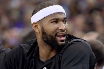SACRAMENTO, CA - FEBRUARY 20:  DeMarcus Cousins #15 of the Sacramento Kings looks on from the side lines against the Boston Celtics during their NBA basketball game at Sleep Train Arena on February 20, 2015 in Sacramento, California. NOTE TO USER: User ex