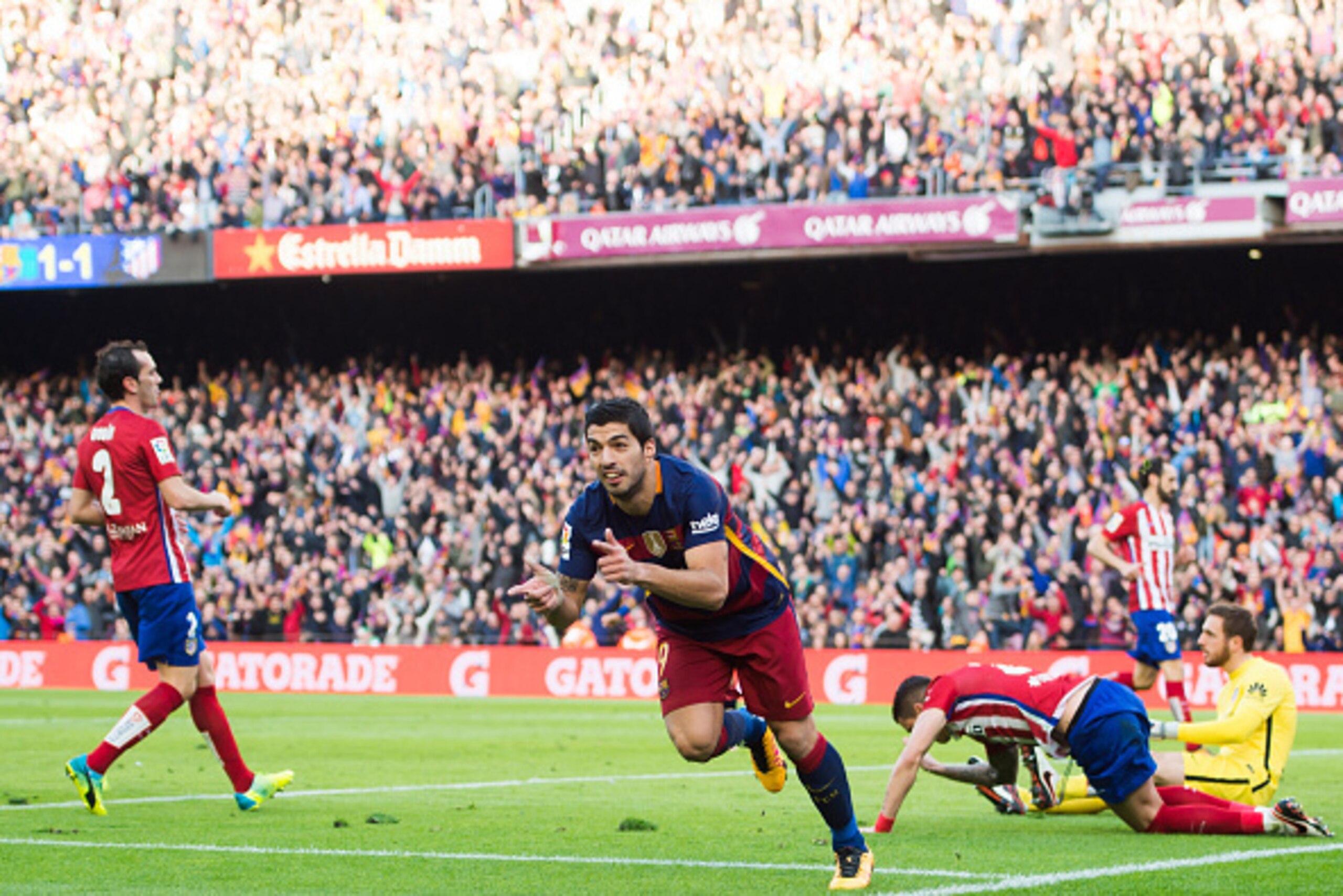 BARCELONA, SPAIN - JANUARY 30:  Luis Suarez of FC Barcelona celebrates after scoring his team's second goal during the La Liga match between FC Barcelona and Club Atletico de Madrid at Camp Nou on January 30, 2016 in Barcelona, Spain.  (Photo by Alex Capa