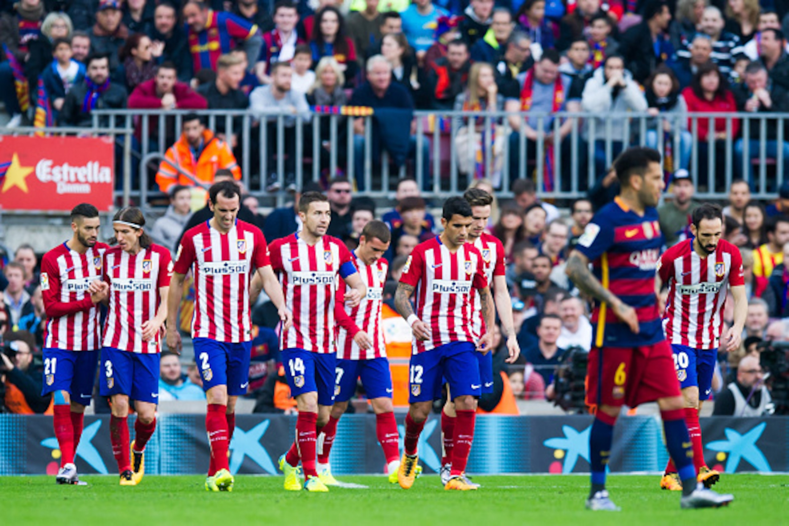 BARCELONA, SPAIN - JANUARY 30: (L-R) Yannick Carrasco, Filipe Luis, Diego Godin, Gabi Fernandez, Antoine Griezmann, Augusto Fernandez, Saul Niguez and Juanfran Torres of Club Atletico de Madrid return to play after their teammate Jorge Resurreccion 'Koke'