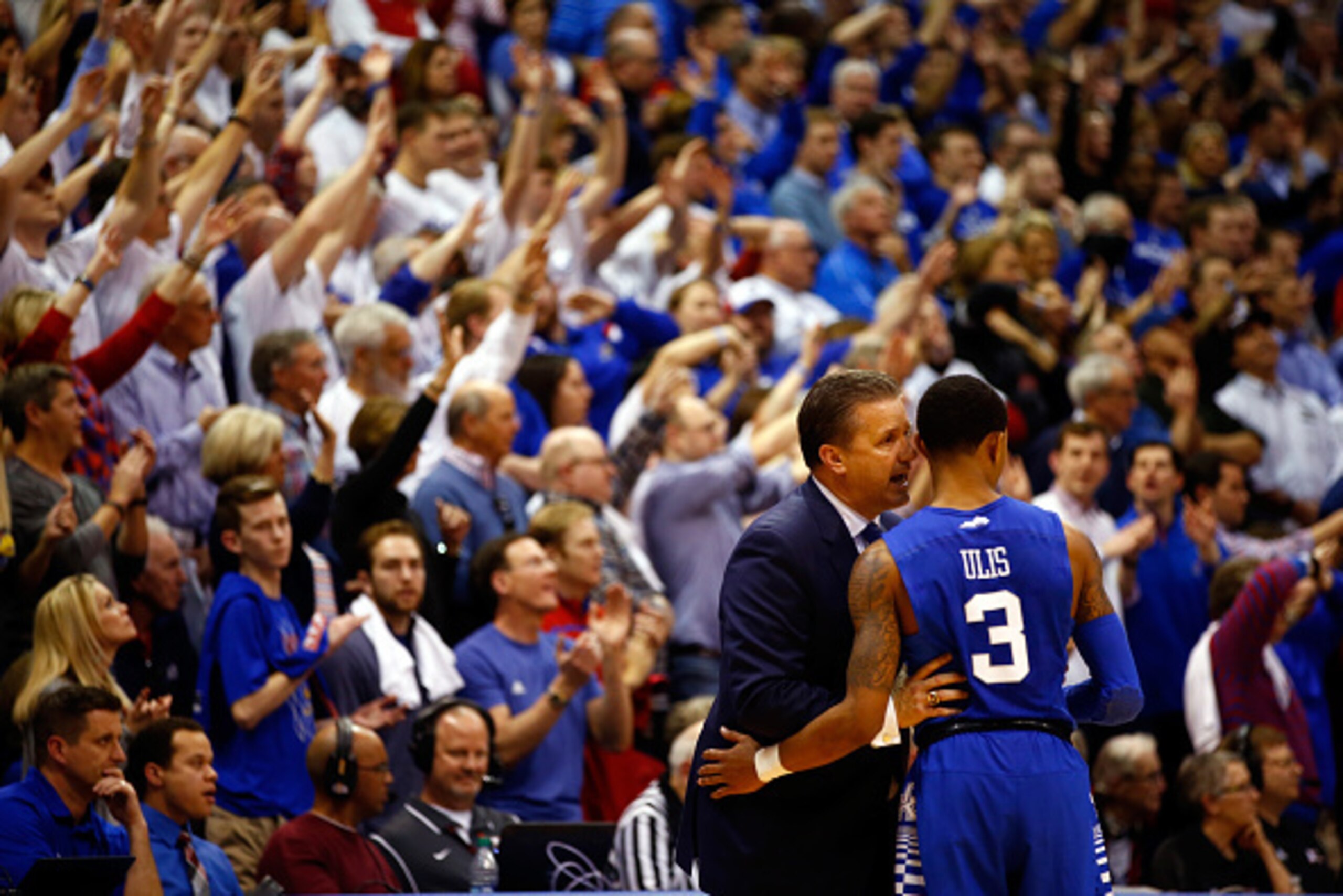 LAWRENCE, KS - JANUARY 30:  Head coach John Calipari of the Kentucky Wildcats talks with Tyler Ulis #3 during the final minutes of overtime in the game against the Kansas Jayhawks at Allen Fieldhouse on January 30, 2016 in Lawrence, Kansas.  (Photo by Jam