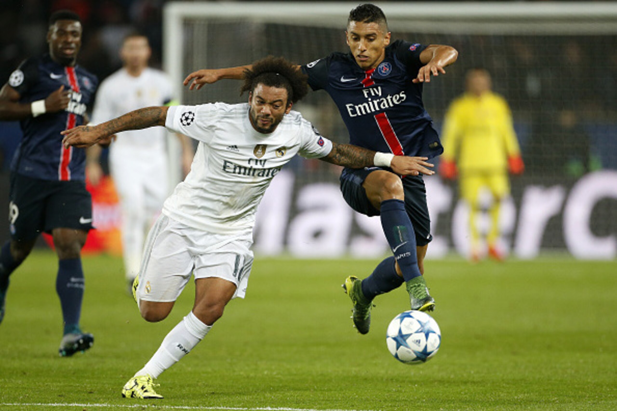 PARIS, FRANCE - OCTOBER 21: Marcelo of Real Madrid and Marquinhos of PSG in action during the UEFA Champions League match between Paris Saint-Germain (PSG) and Real Madrid at Parc des Princes stadium on October 21, 2015 in Paris, France. (Photo by Jean Ca
