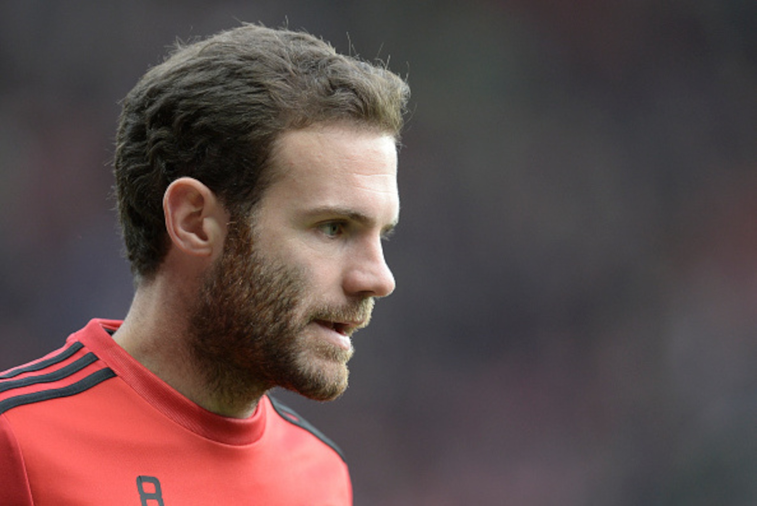 Manchester United's Spanish midfielder Juan Mata warms up before the English Premier League football match between Manchester United and Southampton at Old Trafford in Manchester, north west England, on January 23, 2016. AFP PHOTO / OLI SCARFF

RESTRICTED
