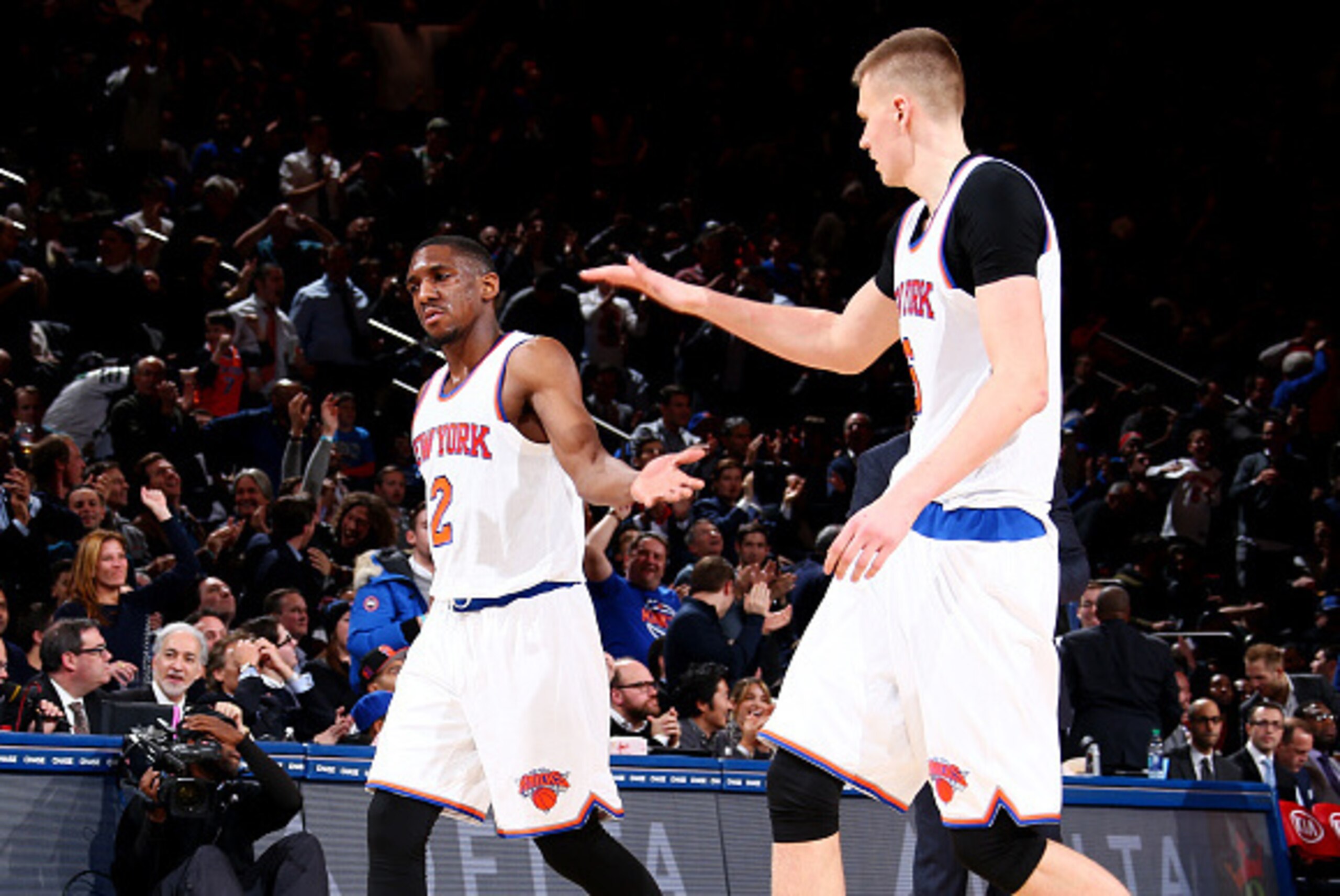 NEW YORK, NY - JANUARY 26: Kristaps Porzingis #6 high fives teammate Langston Galloway #2 of the New York Knicks during the game against the Oklahoma City Thunder on January 26, 2016 at Madison Square Garden in New York, New York. NOTE TO USER: User expre