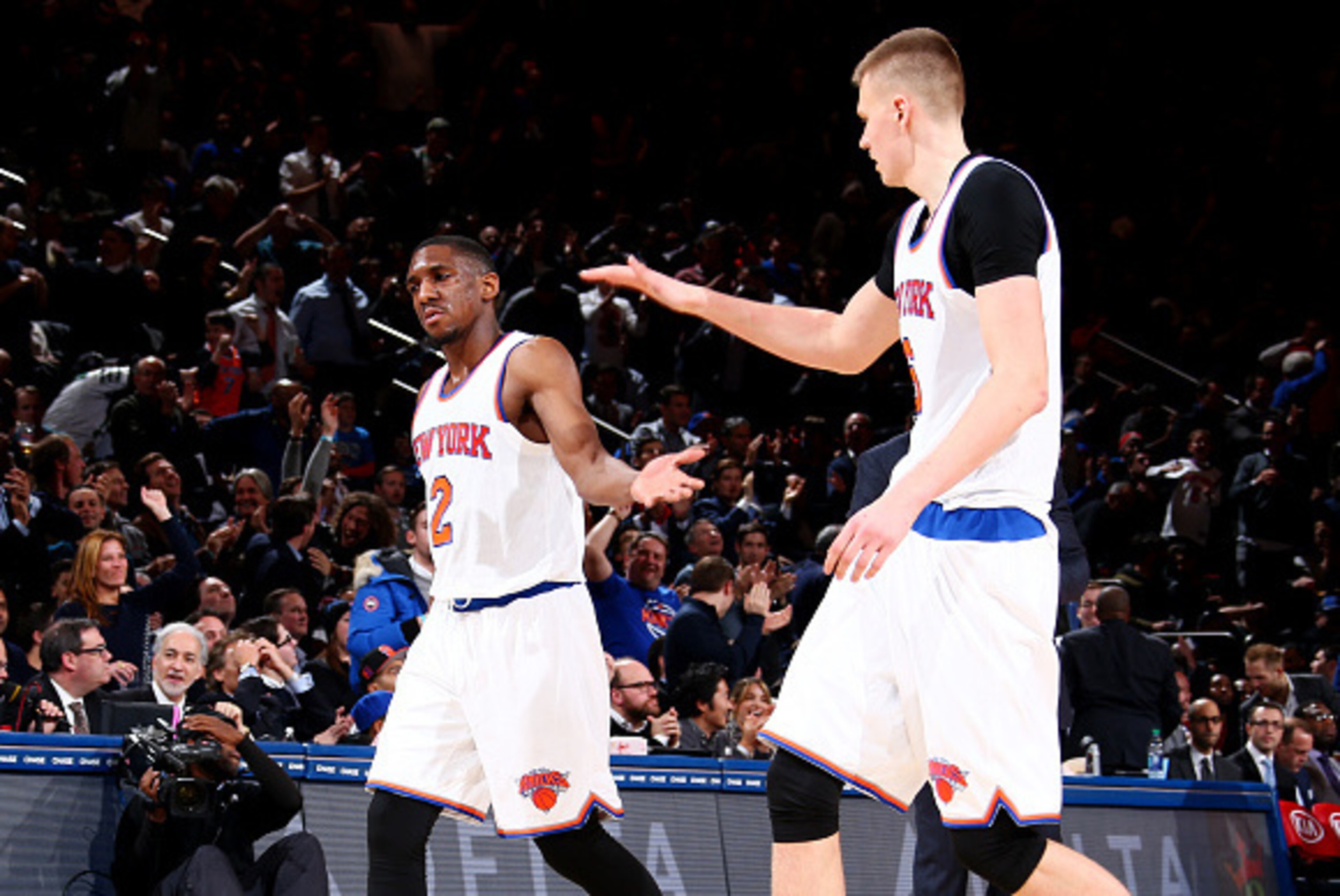 NEW YORK, NY - JANUARY 26: Kristaps Porzingis #6 high fives teammate Langston Galloway #2 of the New York Knicks during the game against the Oklahoma City Thunder on January 26, 2016 at Madison Square Garden in New York, New York. NOTE TO USER: User expre