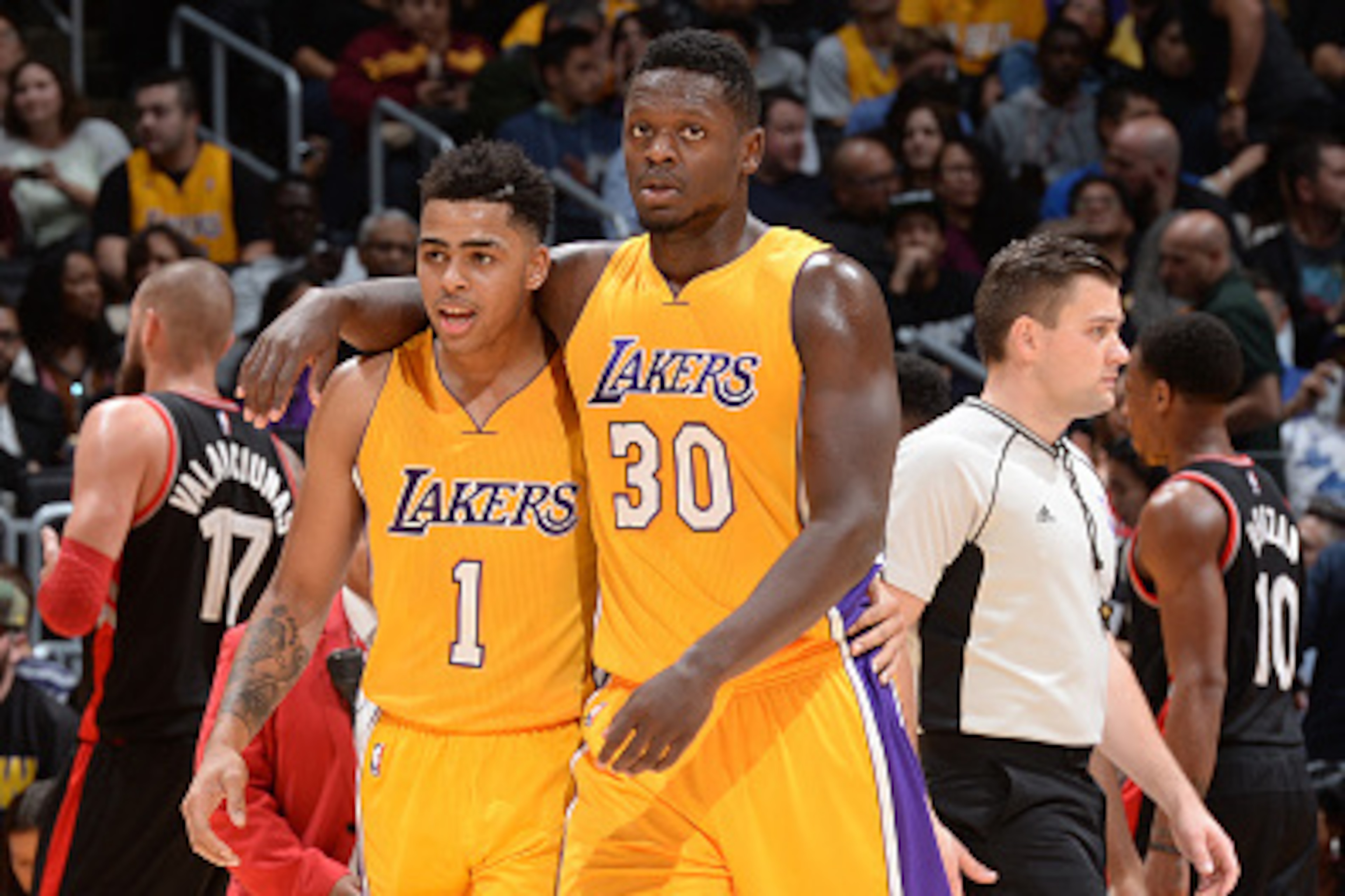 LOS ANGELES, CA - NOVEMBER 20:  Julius Randle #30 of the Los Angeles Lakers and D'Angelo Russell #1 of the Los Angeles Lakers talk during the game against the Toronto Raptors on November 20, 2015 at STAPLES Center in Los Angeles, California. NOTE TO USER: