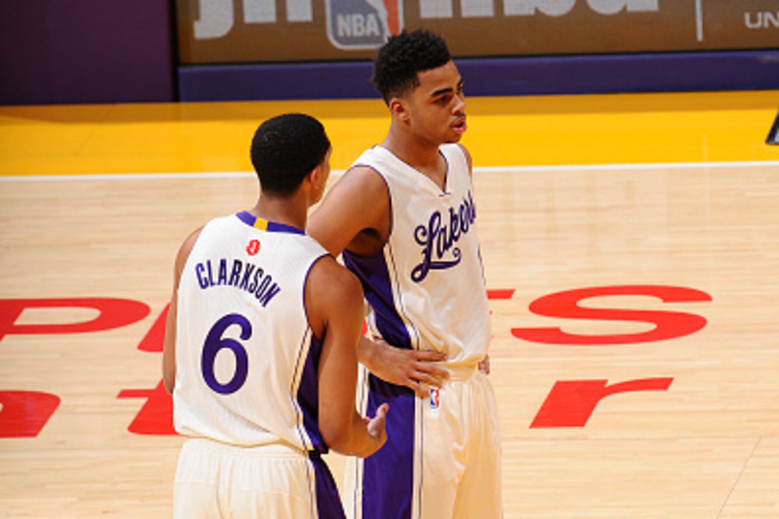LOS ANGELES, CA - DECEMBER 25:  Jordan Clarkson #6 talks with D'Angelo Russell #1 of the Los Angeles Lakers during the game against the Los Angeles Clippers at Staples Center on December 25, 2015 in Los Angeles, California. NOTE TO USER: User expressly ac