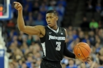 Jan 12, 2016; Omaha, NE, USA; Providence Friars guard Kris Dunn (3) points against the Creighton Bluejays during the first half at CenturyLink Center Omaha. Mandatory Credit: Steven Branscombe-USA TODAY Sports