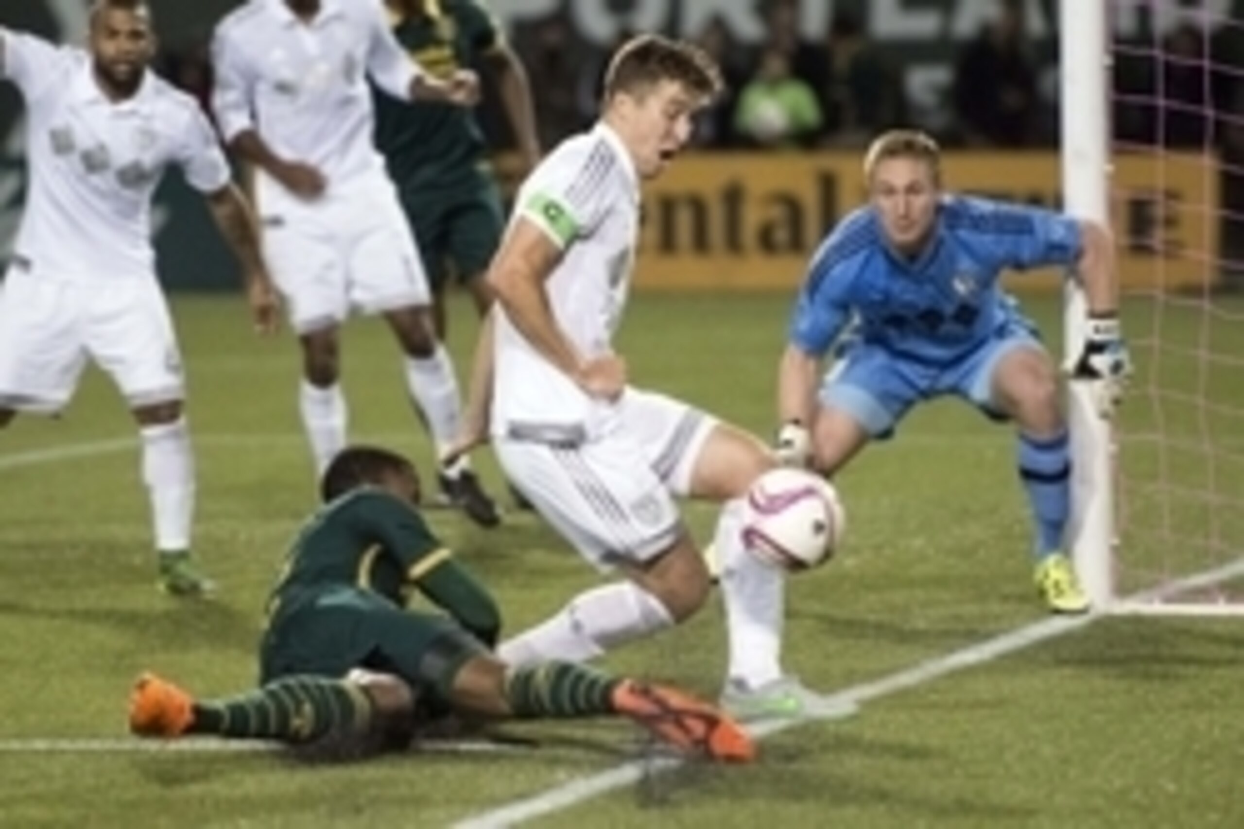 Oct 29, 2015; Portland, OR, USA; Portland Timbers defender Alvas Powell (2) is stopped by Sporting Kansas City defender Matt Besler (5) during the first half at Providence Park. Mandatory Credit: Troy Wayrynen-USA TODAY Sports Oct 29, 2015; Portland, OR, USA; Portland Timbers defender Alvas Powell (2) is stopped by Sporting Kansas City defender Matt Besler (5) during the first half at Providence Park. Mandatory Credit: Troy Wayrynen-USA TODAY Sports