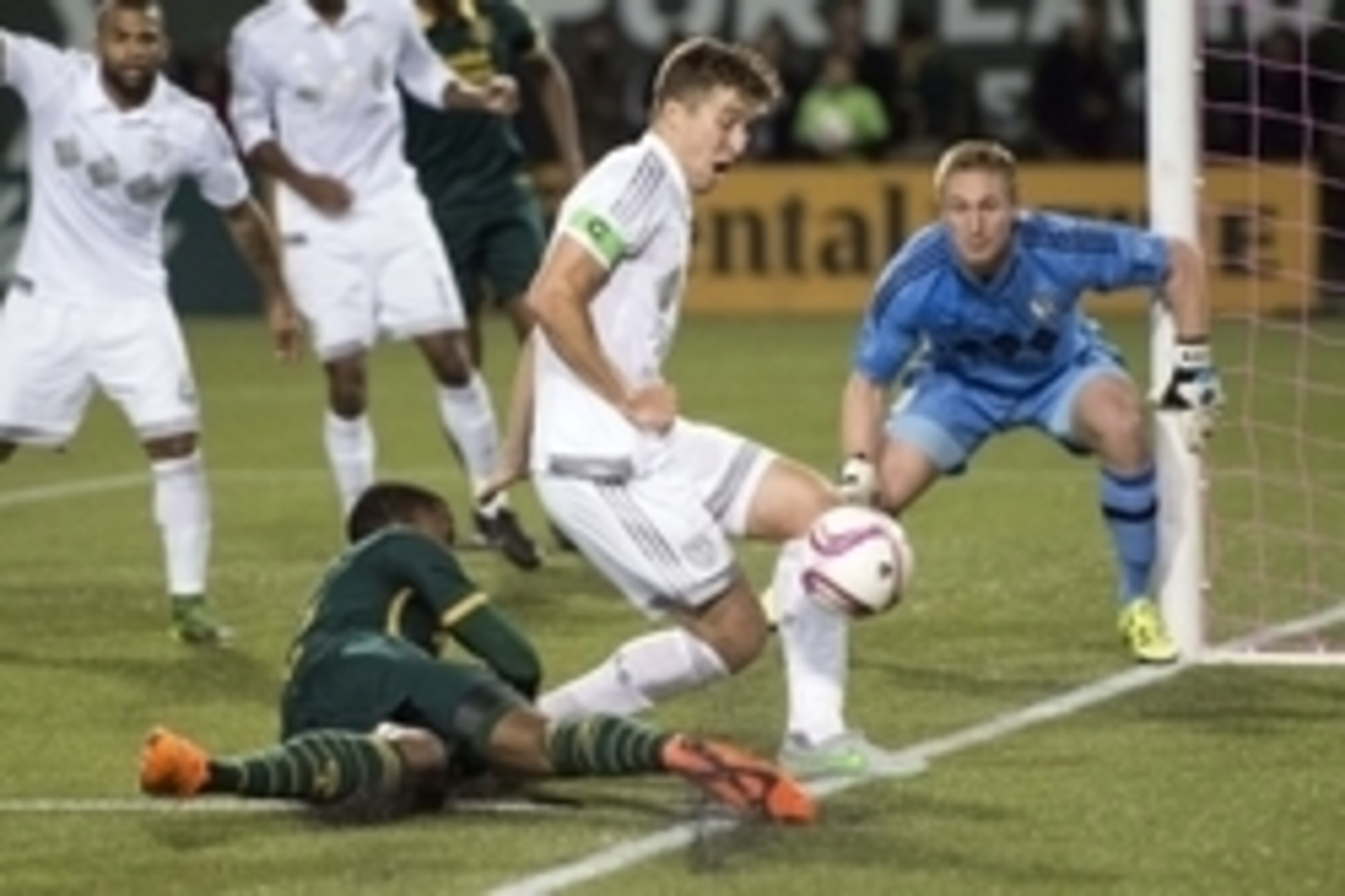 Oct 29, 2015; Portland, OR, USA; Portland Timbers defender Alvas Powell (2) is stopped by Sporting Kansas City defender Matt Besler (5) during the first half at Providence Park. Mandatory Credit: Troy Wayrynen-USA TODAY Sports