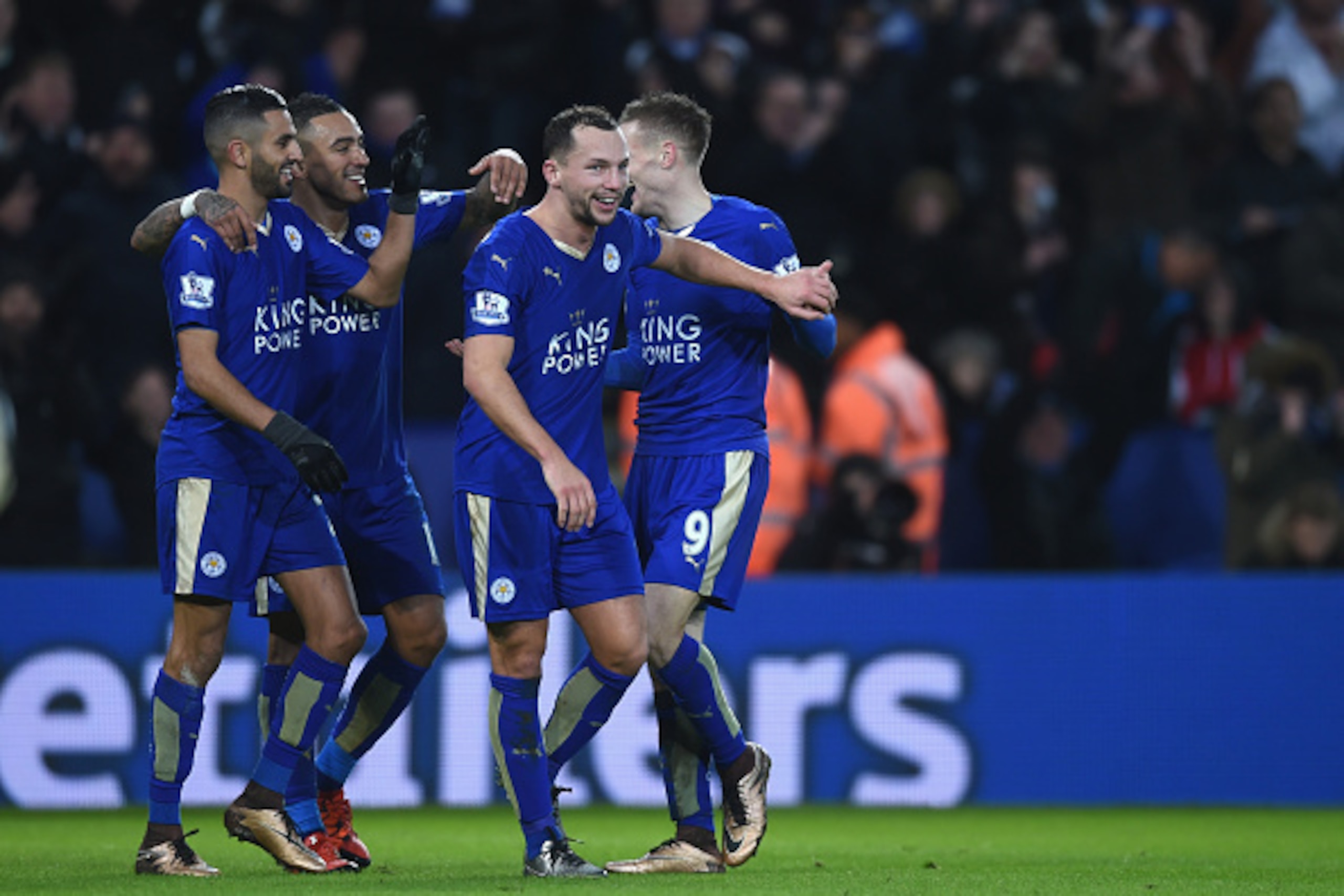 LEICESTER, ENGLAND - JANUARY 23:  Danny Drinkwater of Leicester City celebrates with team mates Riyad Mahrez, Jamie Vardy and Danny Simpson after the 3rd Leicester goal during the Barclays Premier League match between Leicester City and Stoke City at  (Ph