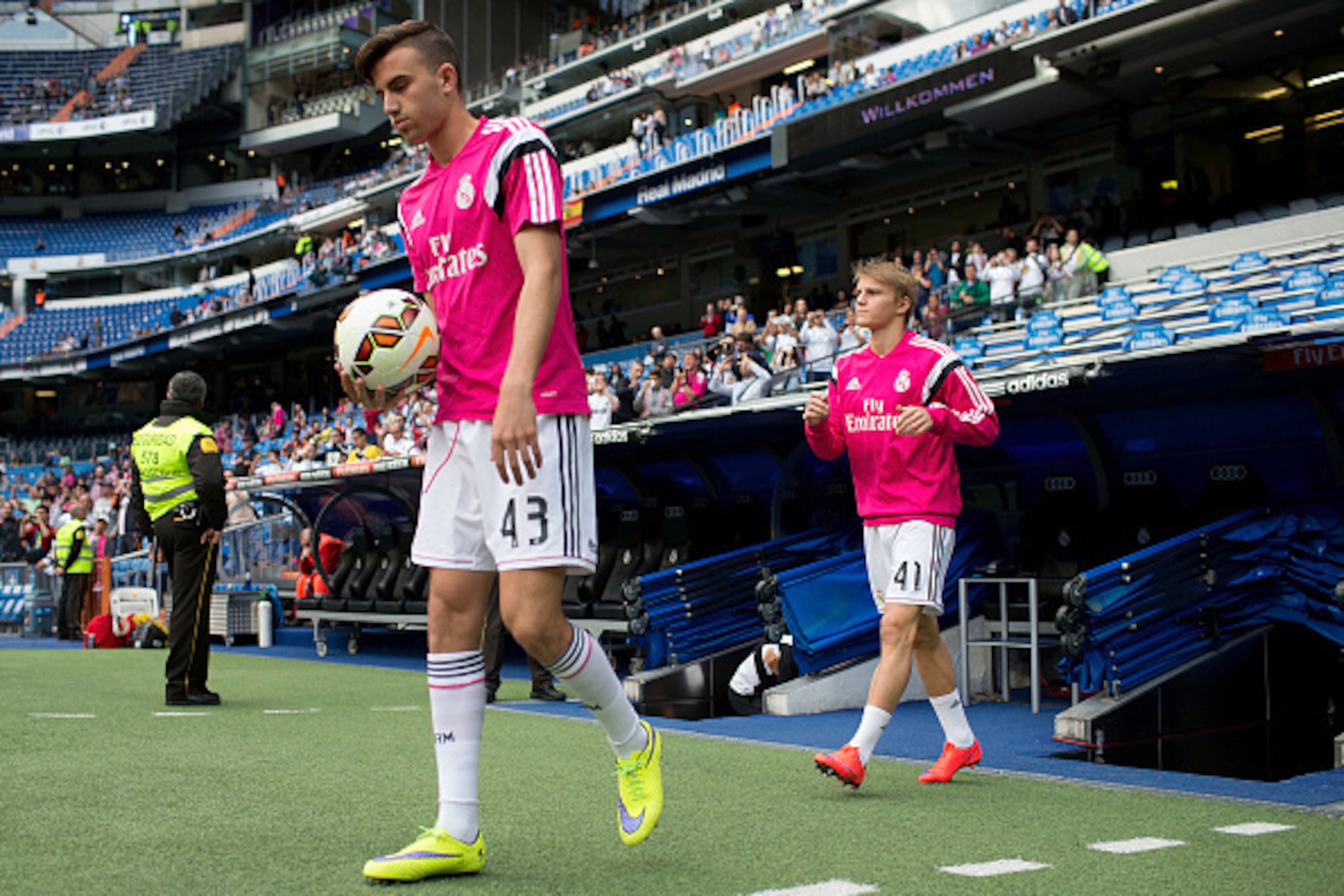 MADRID, SPAIN - APRIL 29: Martin Odegaard (R) of Real Madrid CF acces the pithc with his teammate Borja Mayoral (L) prior to start his warming up before the La Liga match between Real Madrid CF and UD Almeria at Estadio Santiago Bernabeu on April 29, 20 MADRID, SPAIN - APRIL 29: Martin Odegaard (R) of Real Madrid CF acces the pithc with his teammate Borja Mayoral (L) prior to start his warming up before the La Liga match between Real Madrid CF and UD Almeria at Estadio Santiago Bernabeu on April 29, 20