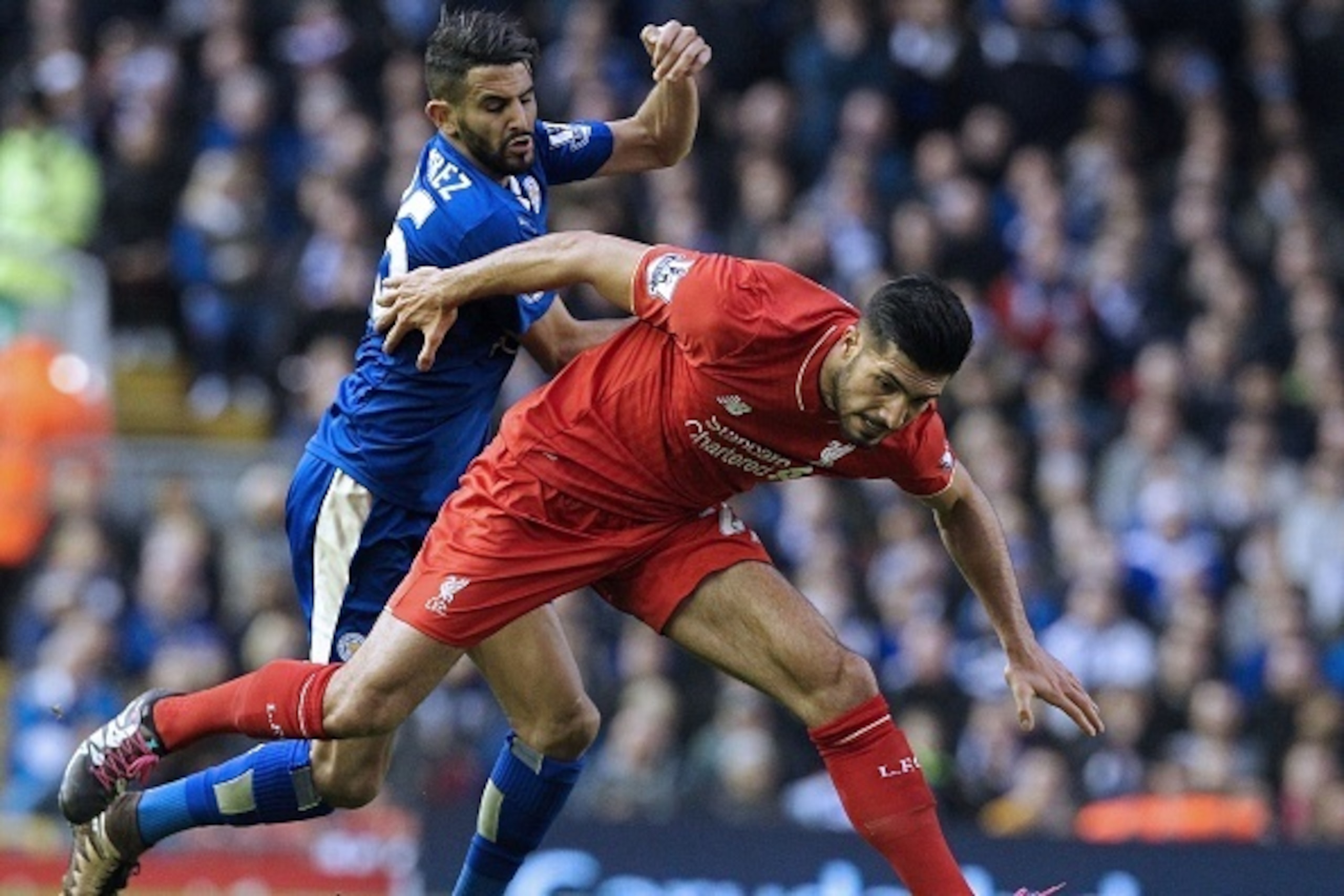 Leicester City's Algerian midfielder Riyad Mahrez (L) vies with Liverpool's German midfielder Emre Can during the English Premier League football match between Liverpool and Leicester City at the Anfield stadium in Liverpool, north-west England on Decembe