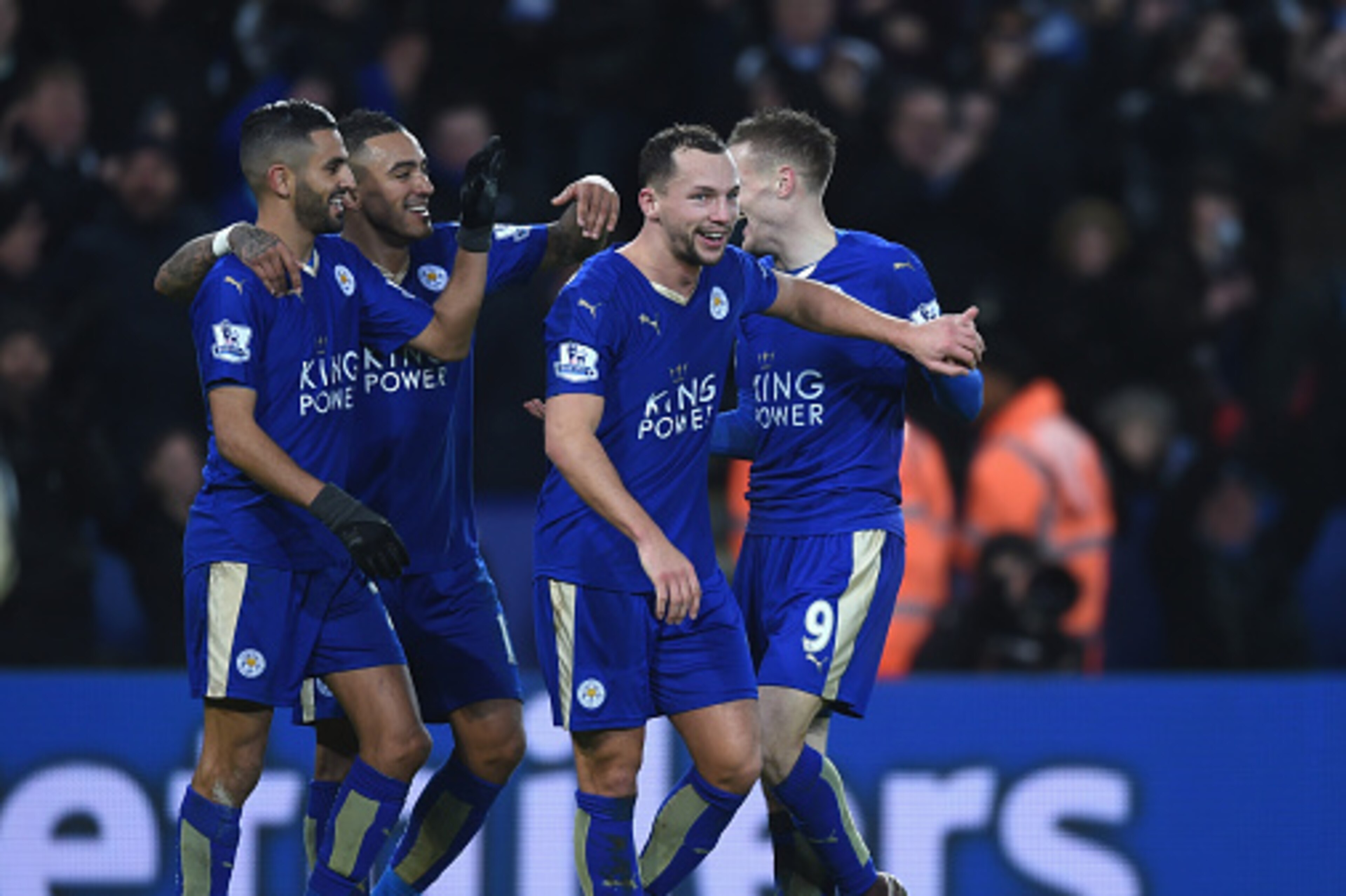 LEICESTER, ENGLAND - JANUARY 23: Danny Drinkwater of Leicester City celebrates with team mates Riyad Mahrez, Jamie Vardy and Danny Simpson after the 3rd Leicester goal during the Barclays Premier League match between Leicester City and Stoke City at (Ph LEICESTER, ENGLAND - JANUARY 23: Danny Drinkwater of Leicester City celebrates with team mates Riyad Mahrez, Jamie Vardy and Danny Simpson after the 3rd Leicester goal during the Barclays Premier League match between Leicester City and Stoke City at (Ph