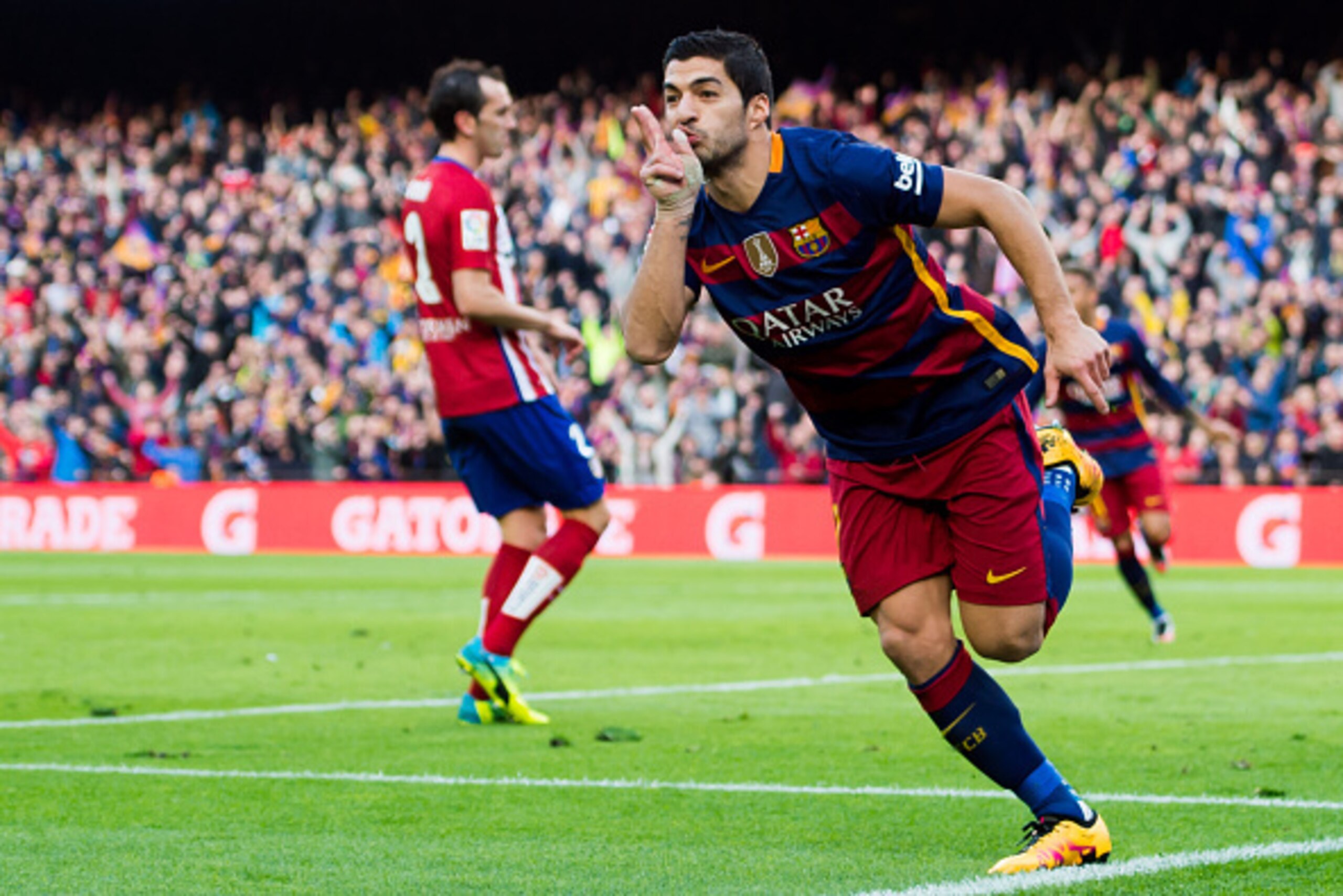 BARCELONA, SPAIN - JANUARY 30:  Luis Suarez of FC Barcelona celebrates after scoring his team's second goal during the La Liga match between FC Barcelona and Club Atletico de Madrid at Camp Nou on January 30, 2016 in Barcelona, Spain.  (Photo by Alex Capa