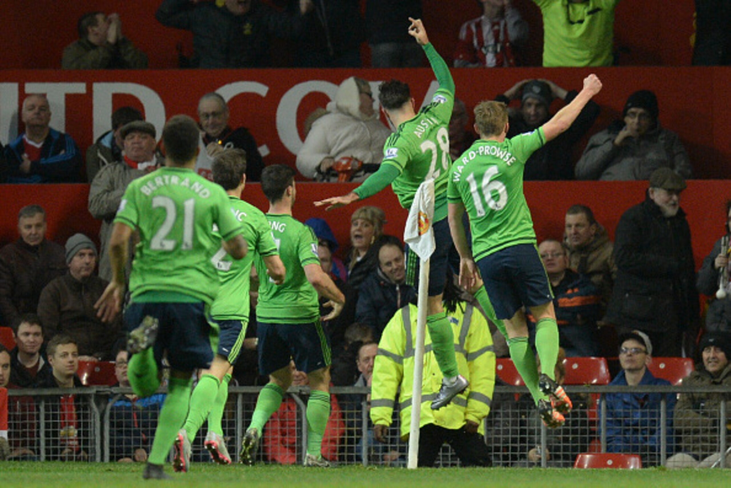 Southampton's English striker Charlie Austin (2R) celebrates scoring the opening goal during the English Premier League football match between Manchester United and Southampton at Old Trafford in Manchester, north west England, on January 23, 2016. AFP PH