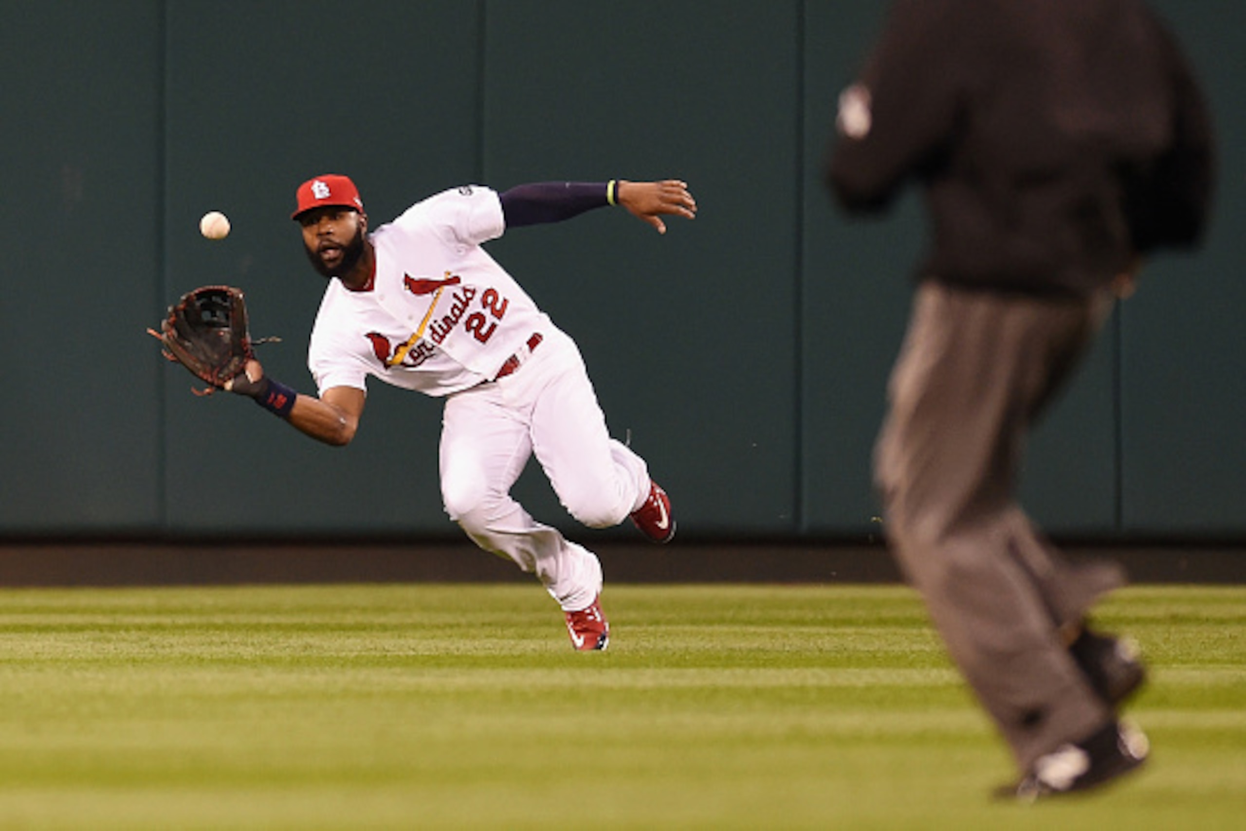 ST LOUIS, MO - OCTOBER 09:  Jason Heyward #22 of the St. Louis Cardinals makes a catch in the third inning against the Chicago Cubs during game one of the National League Division Series at Busch Stadium on October 9, 2015 in St Louis, Missouri.  (Photo b