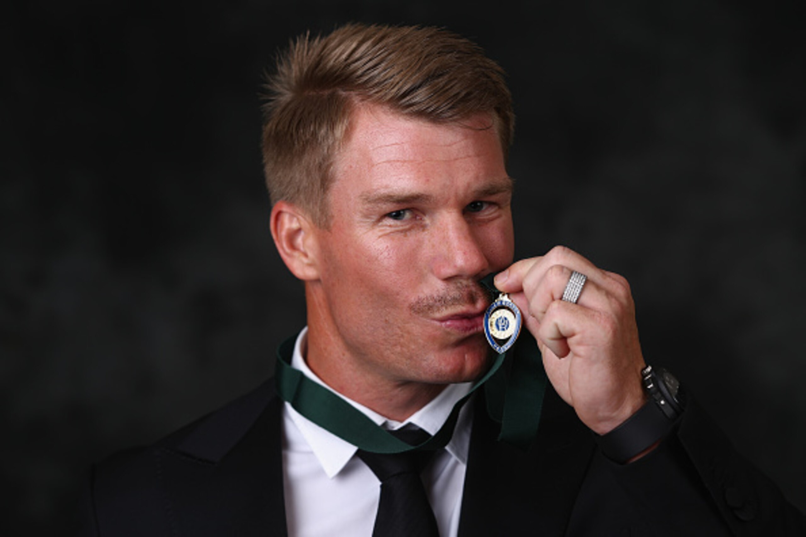 MELBOURNE, AUSTRALIA - JANUARY 27:  David Warner poses after winning the Allan Border medal at the 2016 Allan Border Medal ceremony at Crown Palladium on January 27, 2016 in Melbourne, Australia.  (Photo by Robert Cianflone/Getty Images)