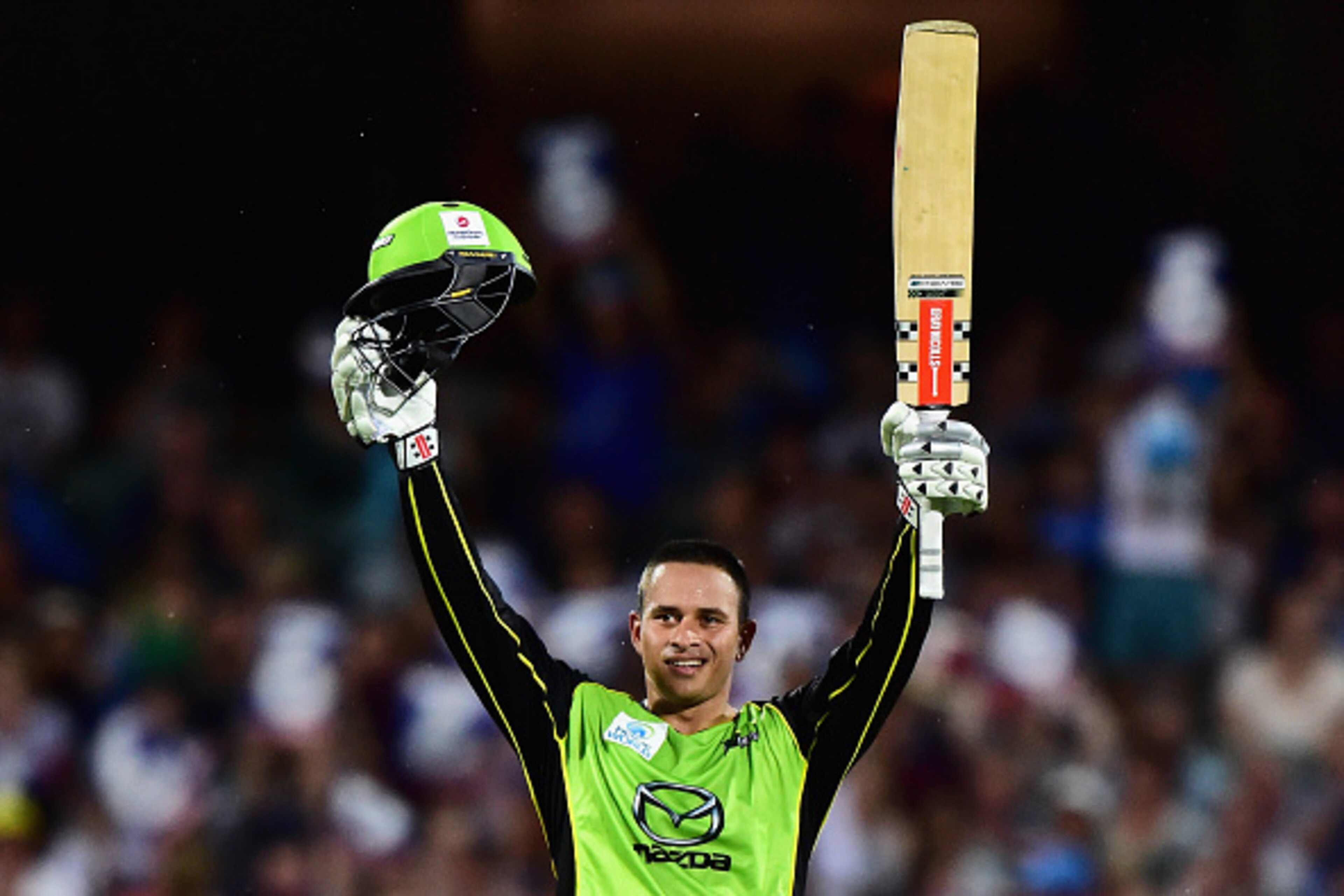 ADELAIDE, AUSTRALIA - JANUARY 21: Usman Khawaja of the Sydney Thunder reacts after reaching his century during the Big Bash League Semi Final match between the Adelaide Strikers and the Sydney Thunder at Adelaide Oval on January 21, 2016 in Adelaide, Aus ADELAIDE, AUSTRALIA - JANUARY 21: Usman Khawaja of the Sydney Thunder reacts after reaching his century during the Big Bash League Semi Final match between the Adelaide Strikers and the Sydney Thunder at Adelaide Oval on January 21, 2016 in Adelaide, Aus
