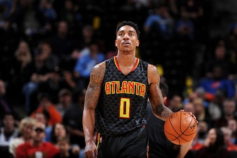 DENVER, CO - JANUARY 25: Jeff Teague #0 of the Atlanta Hawks handles the ball during the game against the Denver Nuggets on January 25, 2016 at the Pepsi Center in Denver, Colorado. NOTE TO USER: User expressly acknowledges and agrees that, by downloading