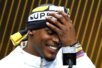 SAN JOSE, CA - FEBRUARY 01:  Cam Newton #1 of the Carolina Panthers addresses the media at Super Bowl Opening Night Fueled by Gatorade at SAP Center on February 1, 2016 in San Jose, California.  (Photo by Thearon W. Henderson/Getty Images)