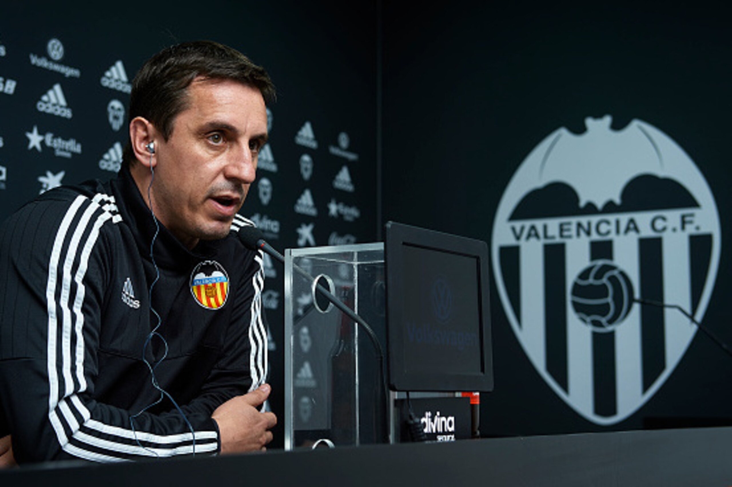 VALENCIA, SPAIN - FEBRUARY 02:  Gary Neville manager of Valencia CF faces the media during a press conference on the eve of the Spanish Copa del Rey semi-final football match between FC Barcelona and Valencia CF at Paterna Training Centre on February 2, 2
