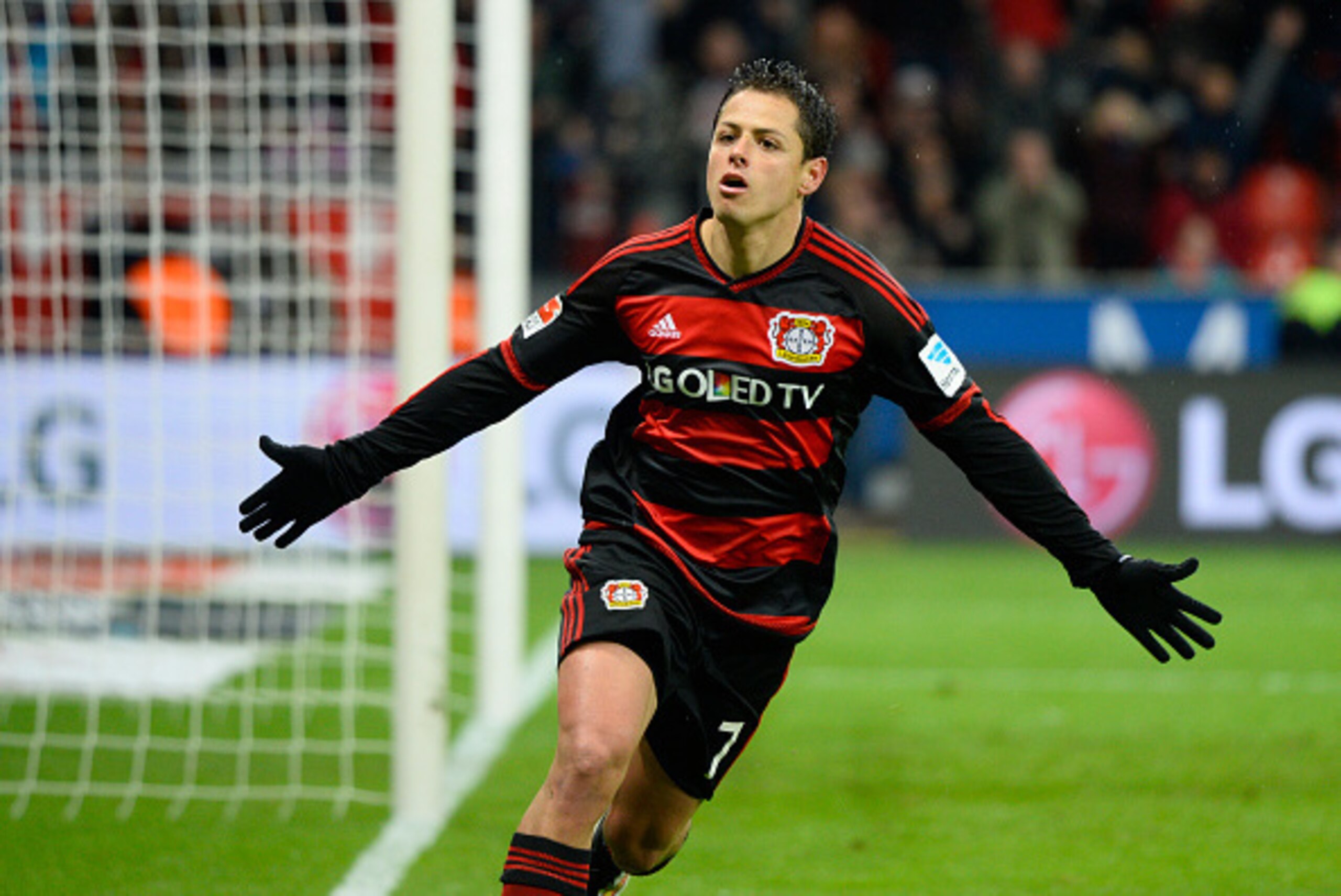 Leverkusen's Mexican forward Javier Hernandez (Chicharito) celebrates after scoring during the German first division Bundesliga football match of Bayer 04 Leverkusen vs Hannover 96 in Leverkusen, western Germany, on January 30, 2016.
Leverkusen won the m Leverkusen's Mexican forward Javier Hernandez (Chicharito) celebrates after scoring during the German first division Bundesliga football match of Bayer 04 Leverkusen vs Hannover 96 in Leverkusen, western Germany, on January 30, 2016.
Leverkusen won the m