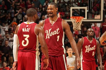 MIAMI, FL - DECEMBER 25:  Chris Bosh #1 of the Miami Heat and Dwyane Wade #3 of the Miami Heat celebrate during the game against the New Orleans Pelicans on December 25, 2015 at American Airlines Arena in Miami, Florida. NOTE TO USER: User expressly ackno