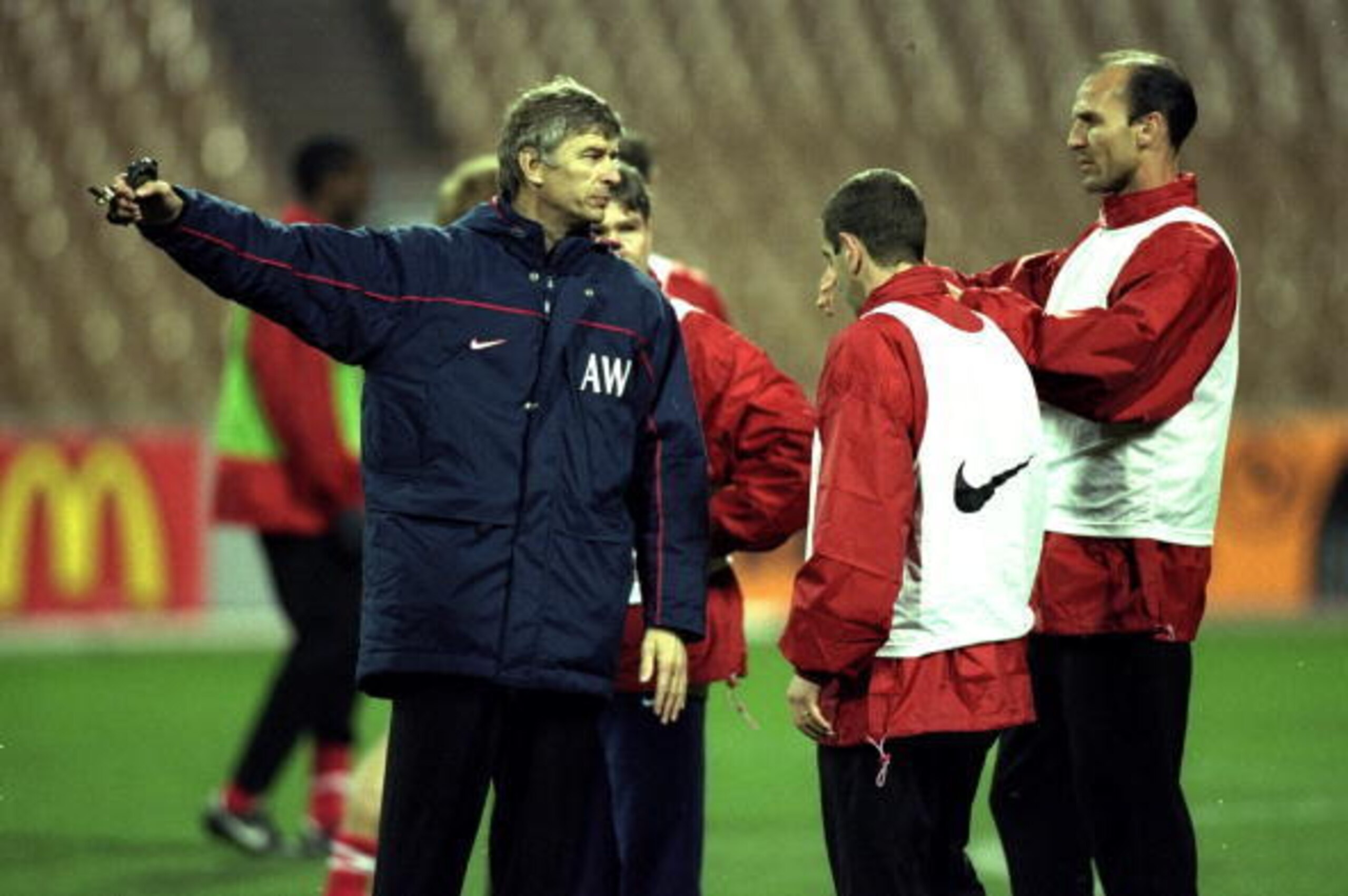 3 Nov 1998:  The Arsenal coach Arsene Wenger with Players Steve Bould and Nigel Winterburn during training before the Champions league match against Dynamo Kiev in Kiev, Ukraine. Dynamo Kiev won the game 3-1. \ Mandatory Credit: Alex Livesey /Allsport