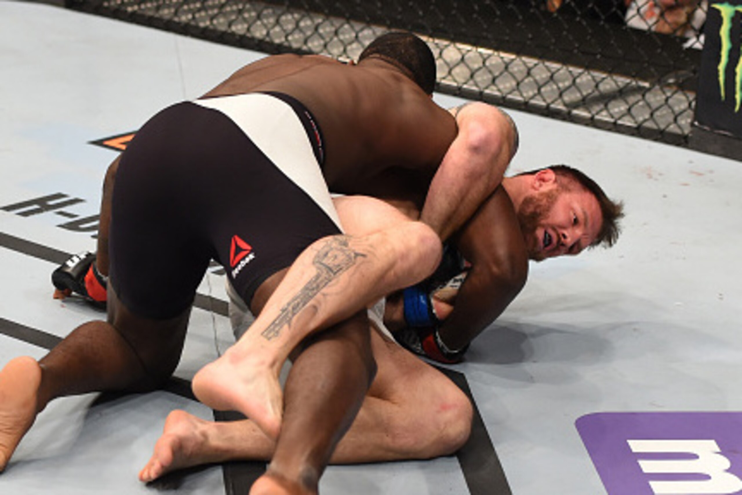 NEWARK, NJ - JANUARY 30:  (R-L) Ryan Bader attempts to submit Anthony Johnson in their light heavyweight bout during the UFC Fight Night event at the Prudential Center on January 30, 2016 in Newark, New Jersey. (Photo by Josh Hedges/Zuffa LLC/Zuffa LLC vi