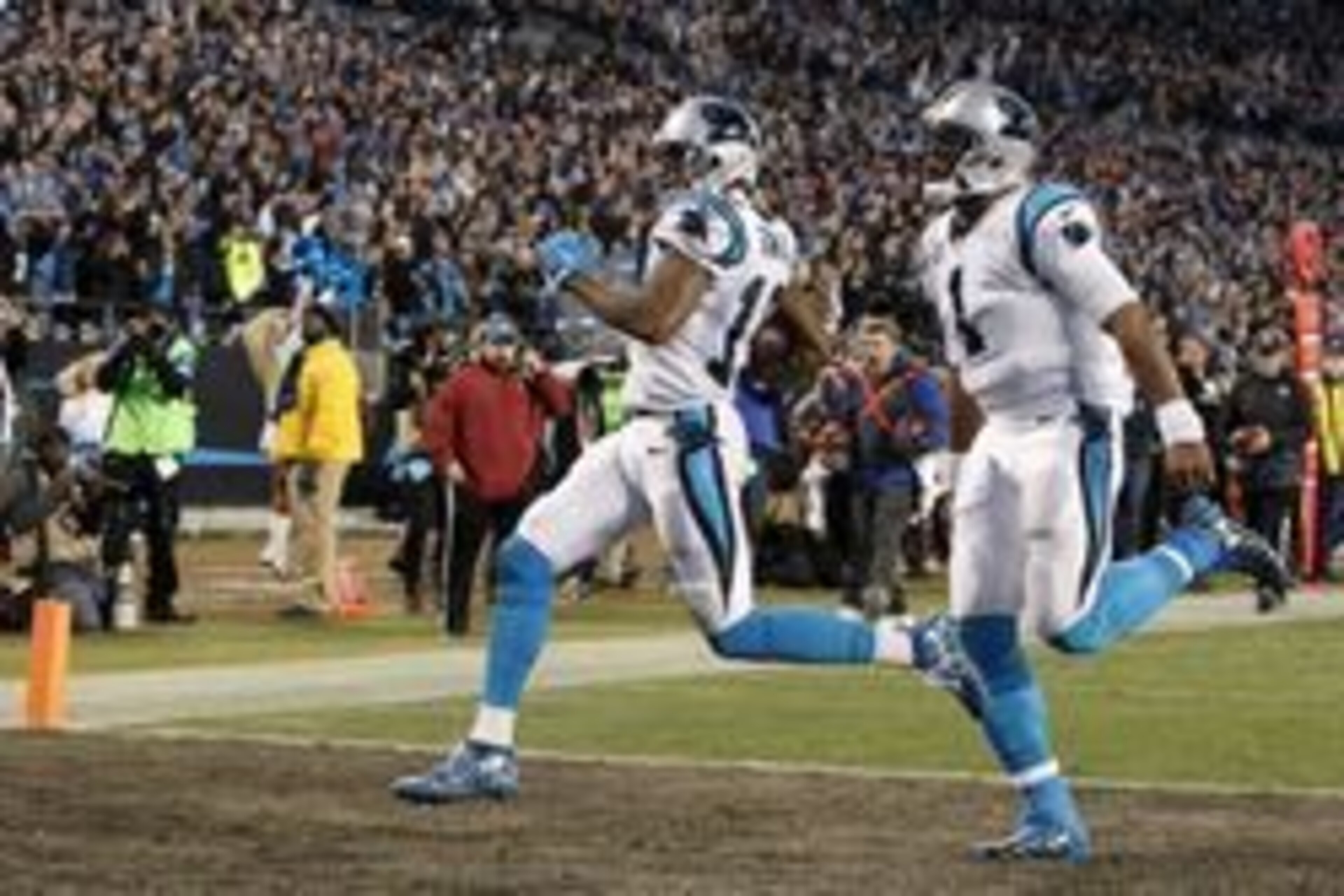 Jan 24, 2016; Charlotte, NC, USA; Carolina Panthers wide receiver Ted Ginn (19) scores a touchdown during the first quarter against the Arizona Cardinals in the NFC Championship football game at Bank of America Stadium. Mandatory Credit: Jeremy Brevard-US