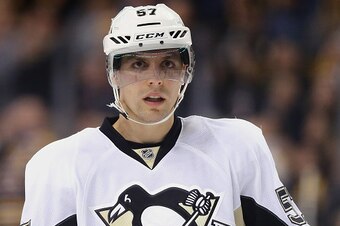 BOSTON, MA - DECEMBER 16:  David Perron #57 of the Pittsburgh Penguins looks on during the second period against the Boston Bruins at TD Garden on December 16, 2015 in Boston, Massachusetts.  (Photo by Maddie Meyer/Getty Images)