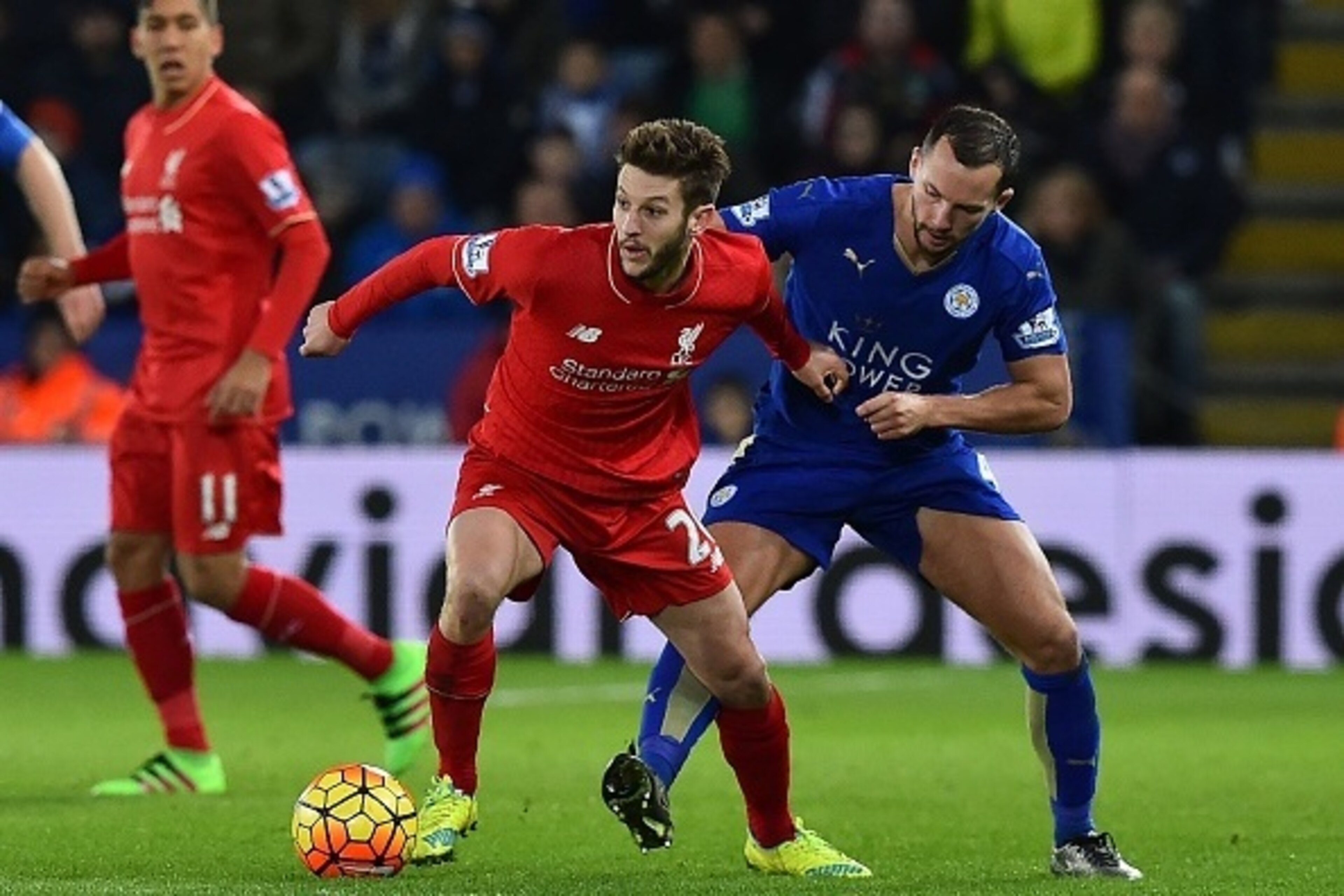 Liverpool's English midfielder Adam Lallana (L) vies with Leicester City's English midfielder Danny Drinkwater during the English Premier League football match between Leicester City and Liverpool at King Power Stadium in Leicester, central England on Feb