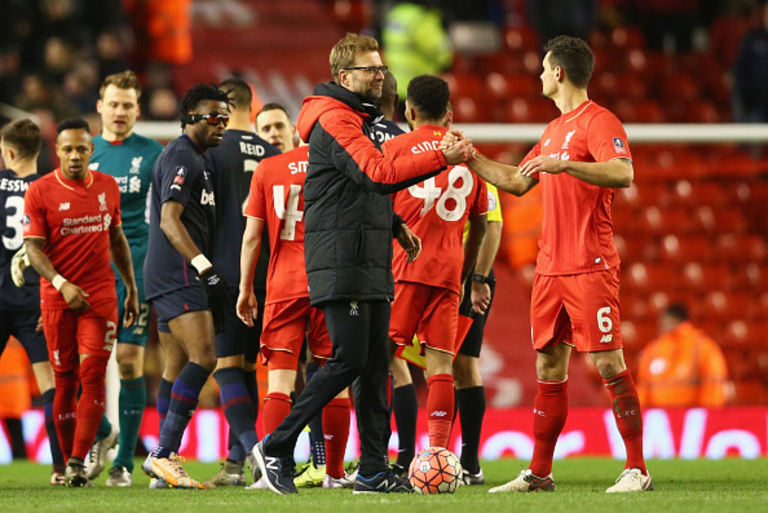 LIVERPOOL, ENGLAND - JANUARY 30:  Jurgen Klopp manager of Liverpool shakes hands with Dejan Lovren of Liverpool after the Emirates FA Cup Fourth Round match between Liverpool and West Ham United at Anfield on January 30, 2016 in Liverpool, England.  (Phot