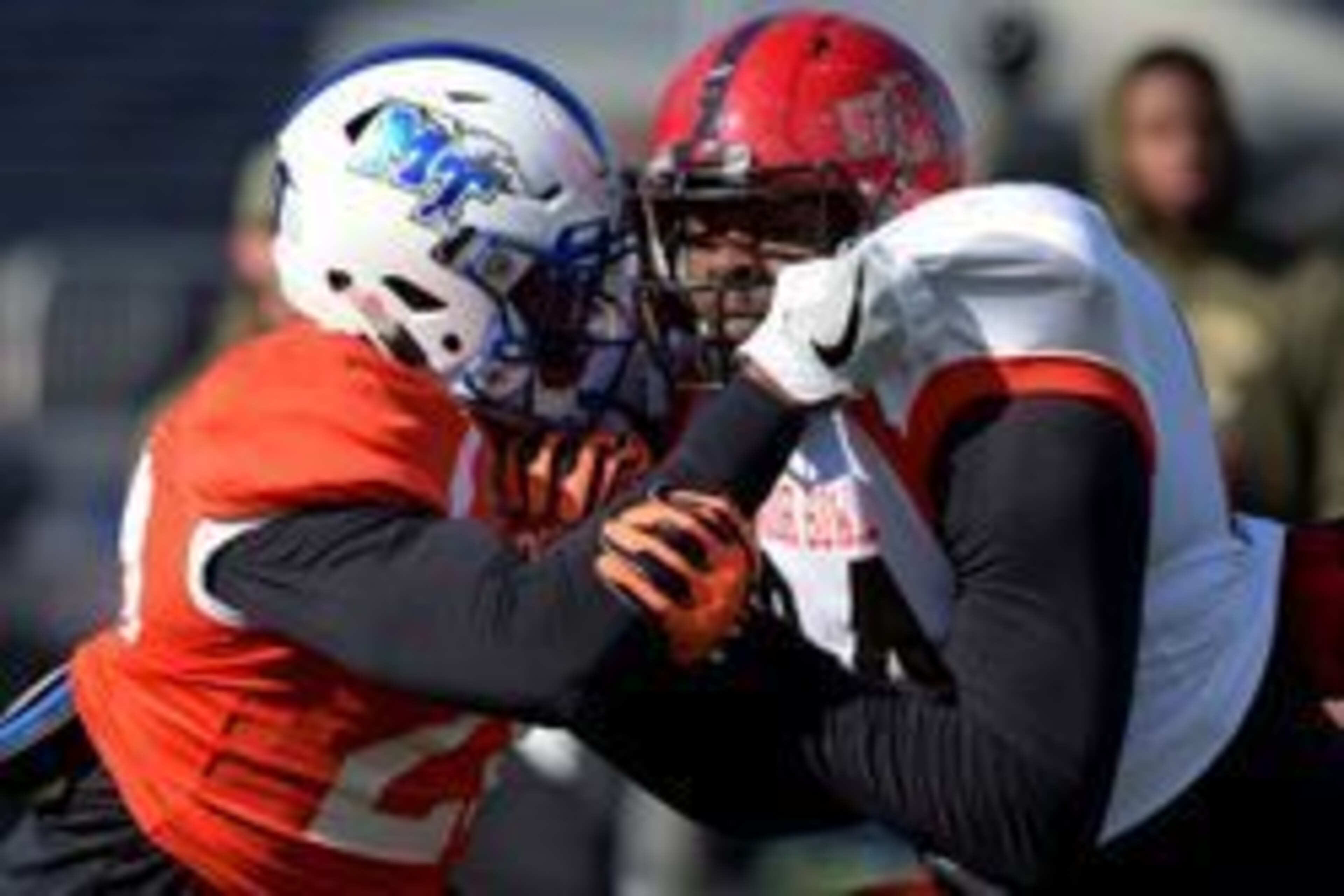 Jan 28, 2016; Mobile, AL, USA; South squad safety Kevin Byard of Middle Tennessee (left) battles tight end Darion Griswold of Arkansas State (right) in a pass receiving drill during Senior Bowl practice at Ladd-Peebles Stadium. Mandatory Credit:  Glenn An