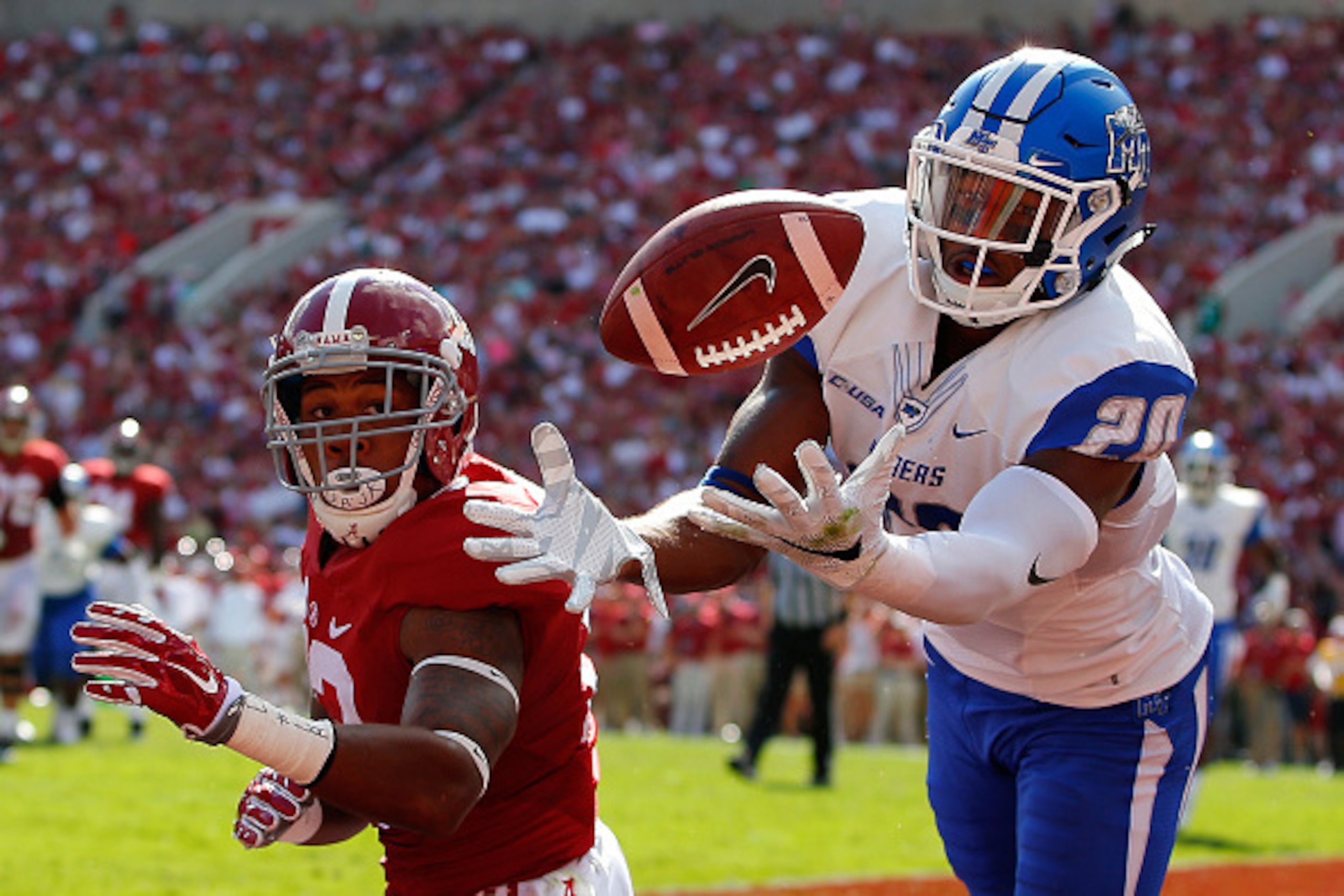 TUSCALOOSA, AL - SEPTEMBER 12:  Kevin Byard #20 of the Middle Tennessee Blue Raiders fails to intercept this pass that was broken up while defending against ArDarius Stewart #13 of the Alabama Crimson Tide at Bryant-Denny Stadium on September 12, 2015 in 