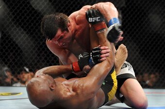 OAKLAND, CA - AUGUST 07:  Chael Sonnen punches Anderson Silva while on the ground during the UFC Middleweight Championship bout at Oracle Arena on August 7, 2010 in Oakland, California.  (Photo by Jon Kopaloff/Zuffa LLC/Zuffa LLC via Getty Images)