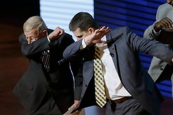 Jim Harbaugh "dabs" with Lou Holtz.