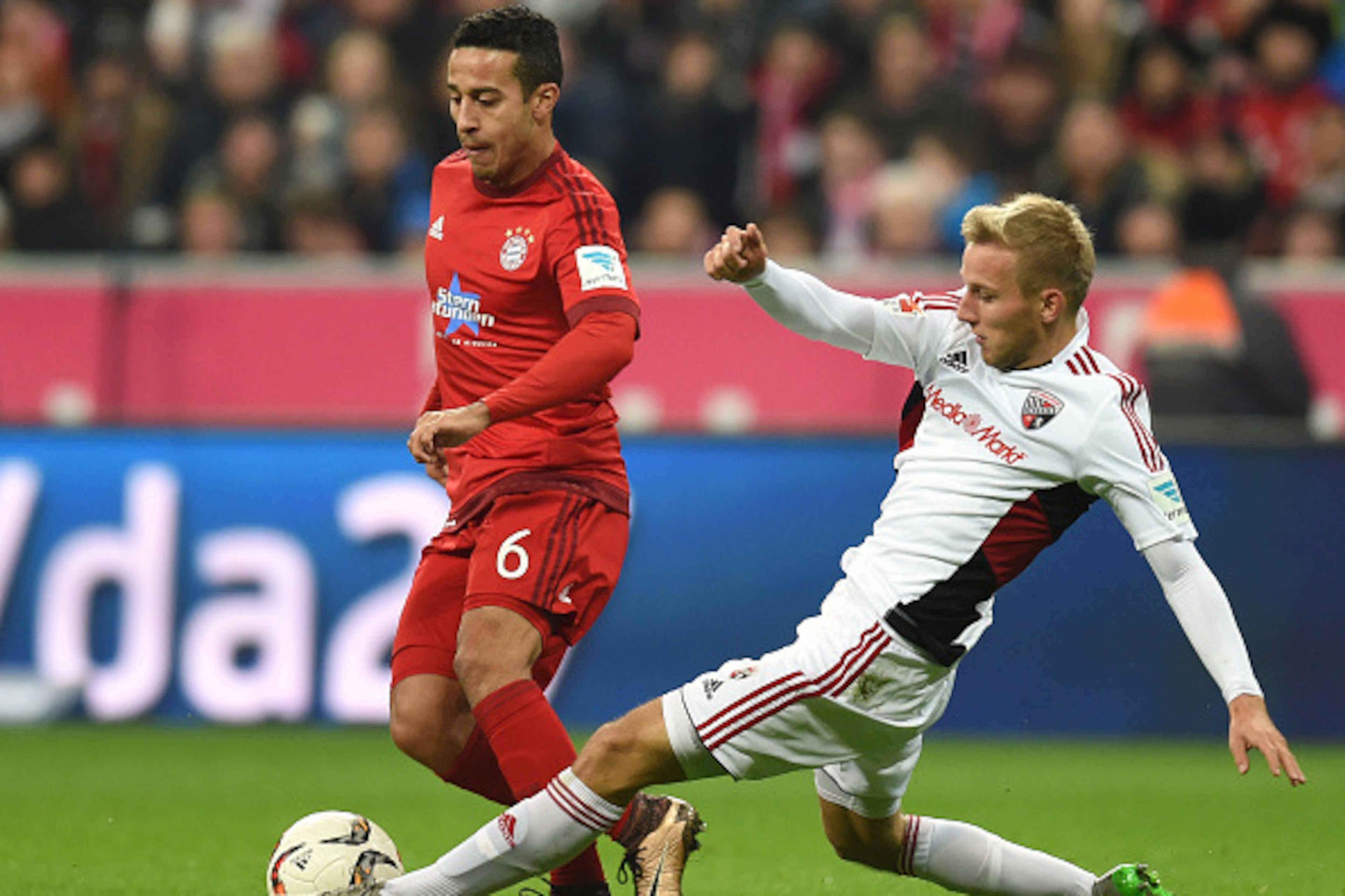 Bayern Munich's Spanish midfielder Thiago Alcantara (L) and Ingolstadt's midfielder Stefan Wannenwetsch (R) vie for the ball during the German first division Bundesliga football match FC Bayern Munich vs FC Ingolstadt 04 in Munich, southern Germany, on De Bayern Munich's Spanish midfielder Thiago Alcantara (L) and Ingolstadt's midfielder Stefan Wannenwetsch (R) vie for the ball during the German first division Bundesliga football match FC Bayern Munich vs FC Ingolstadt 04 in Munich, southern Germany, on De