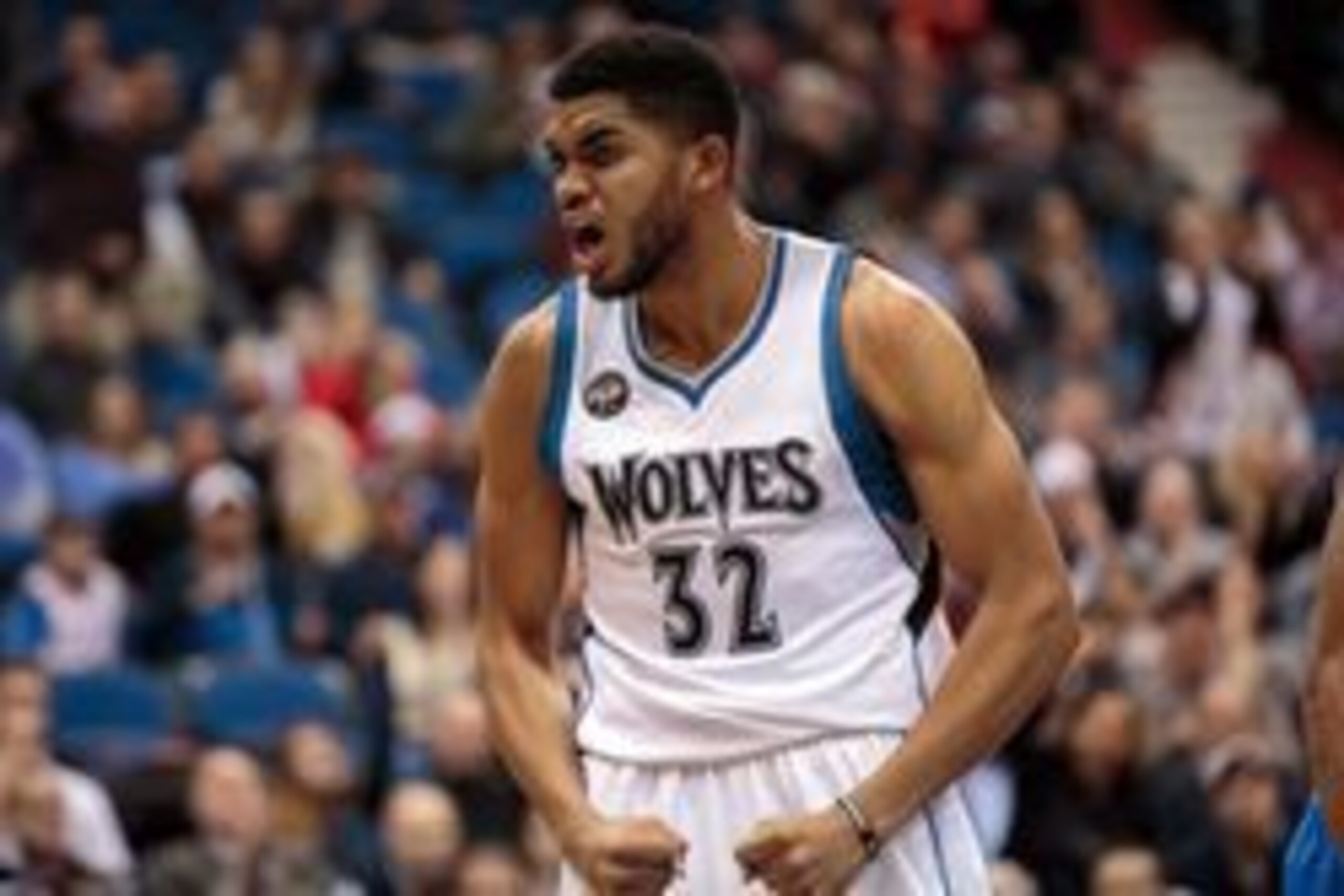 Jan 27, 2016; Minneapolis, MN, USA; Minnesota Timberwolves center Karl-Anthony Towns (32) celebrates a basket in the fourth quarter against the Oklahoma City Thunder at Target Center. The Oklahoma City Thunder beat the Minnesota Timberwolves 126-123. Mand