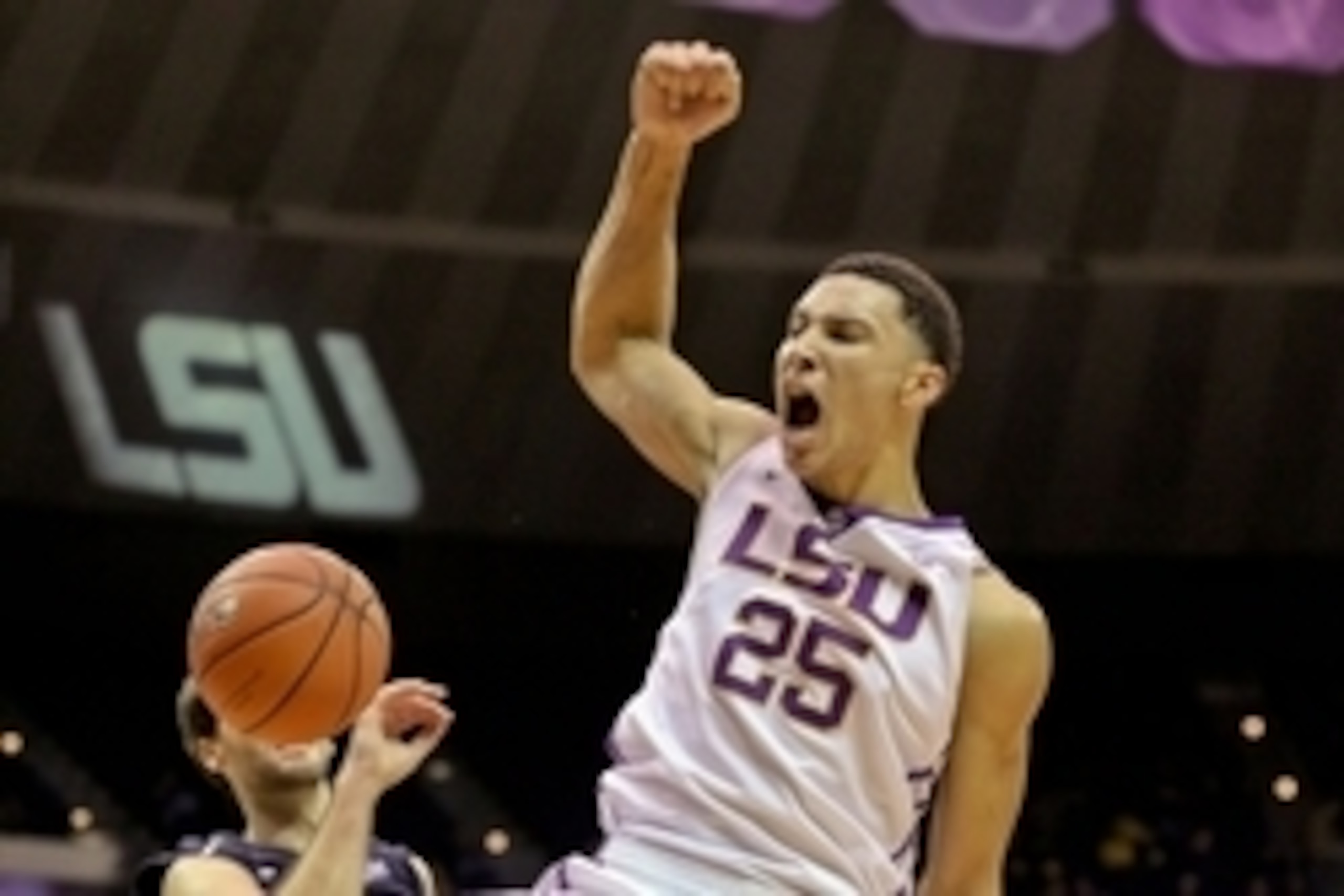 Dec 2, 2015; Baton Rouge, LA, USA; LSU Tigers forward Ben Simmons (25) dunks over North Florida Ospreys guard Beau Beech (2) during the first half of a game at the Pete Maravich Assembly Center. Mandatory Credit: Derick E. Hingle-USA TODAY Sports