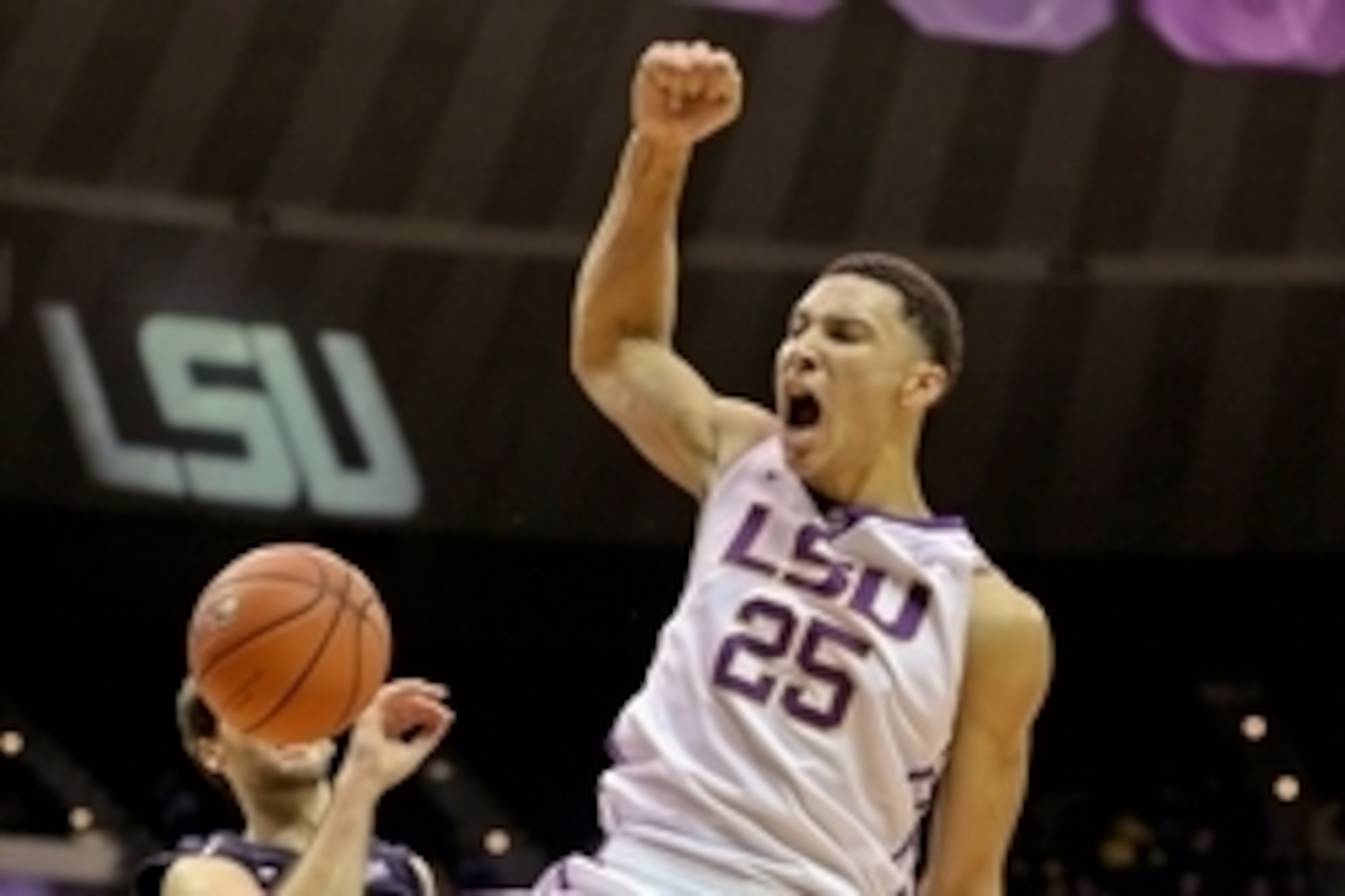 Dec 2, 2015; Baton Rouge, LA, USA; LSU Tigers forward Ben Simmons (25) dunks over North Florida Ospreys guard Beau Beech (2) during the first half of a game at the Pete Maravich Assembly Center. Mandatory Credit: Derick E. Hingle-USA TODAY Sports