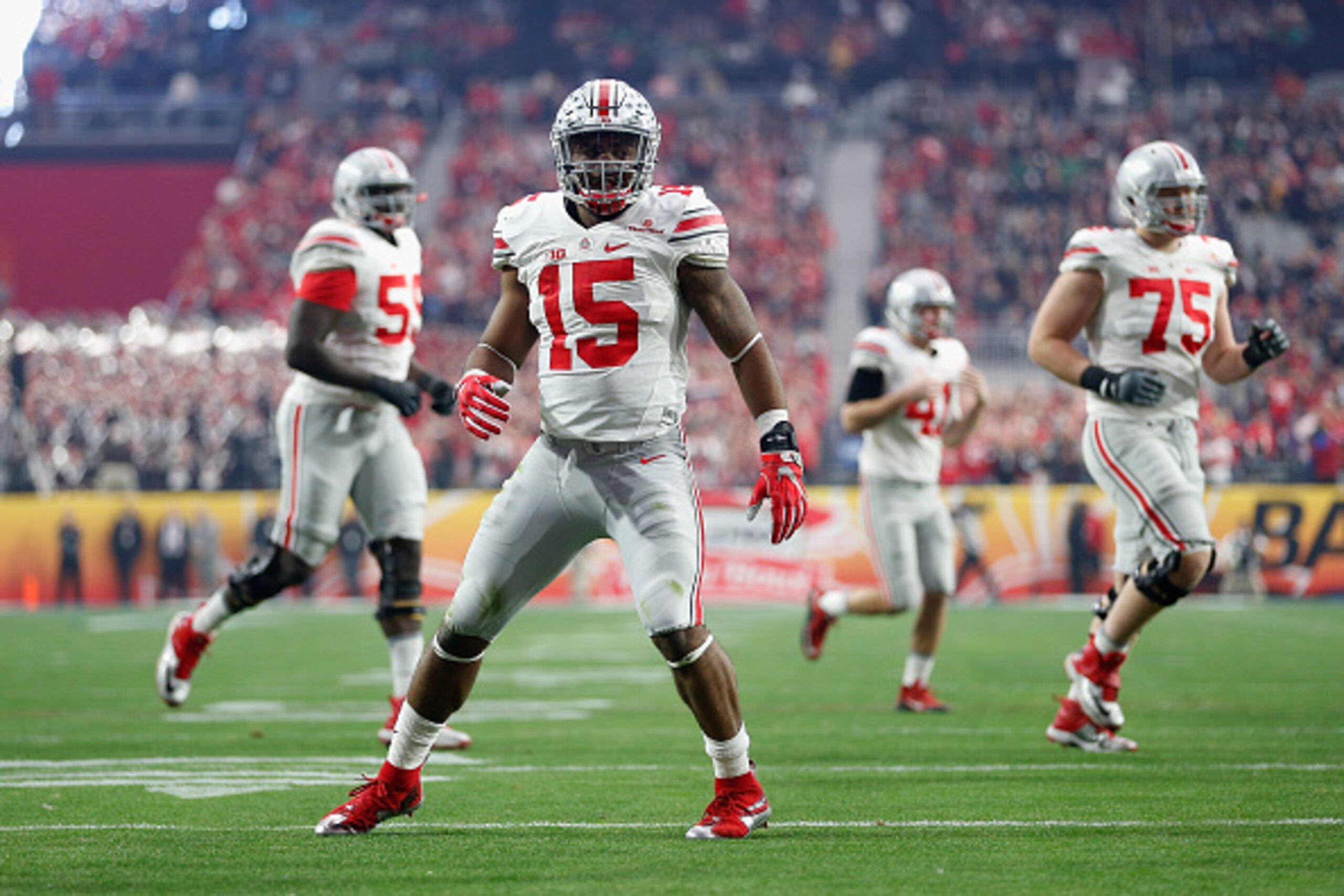 GLENDALE, AZ - JANUARY 01: Running back Ezekiel Elliott #15 of the Ohio State Buckeyes celebrates his first quarter touchdown during the BattleFrog Fiesta Bowl against the Notre Dame Fighting Irish at University of Phoenix Stadium on January 1, 2016 in Gl