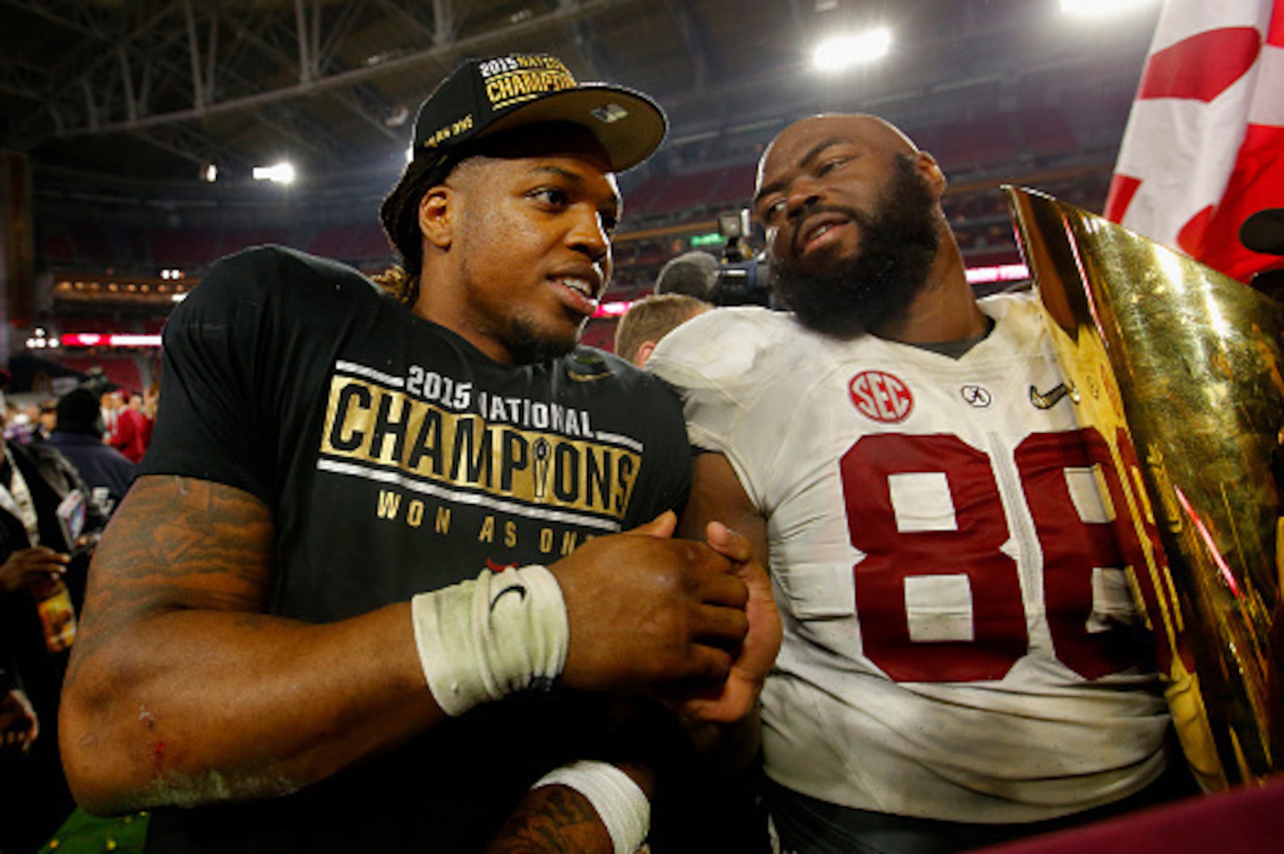 GLENDALE, AZ - JANUARY 11:  Derrick Henry #2 and A'Shawn Robinson #86 of the Alabama Crimson Tide celebrate after defeating the Clemson Tigers in the 2016 College Football Playoff National Championship Game at University of Phoenix Stadium on January 11, 