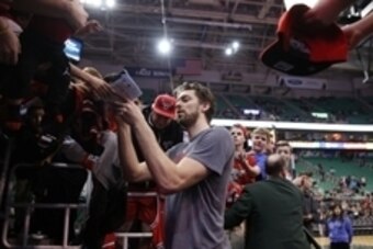 Feb 1, 2016; Salt Lake City, UT, USA;  Chicago Bulls center Pau Gasol (16) signs autographs for Bulls fans prior to their game against the Utah Jazz at Vivint Smart Home Arena. Mandatory Credit: Jeff Swinger-USA TODAY Sports