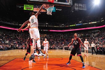 PHOENIX, AZ - FEBRUARY 2:  Markieff Morris #11 of the Phoenix Suns dunks against the Toronto Raptors on February 2, 2016 at Talking Stick Resort Arena in Phoenix, Arizona. NOTE TO USER: User expressly acknowledges and agrees that, by downloading and or us